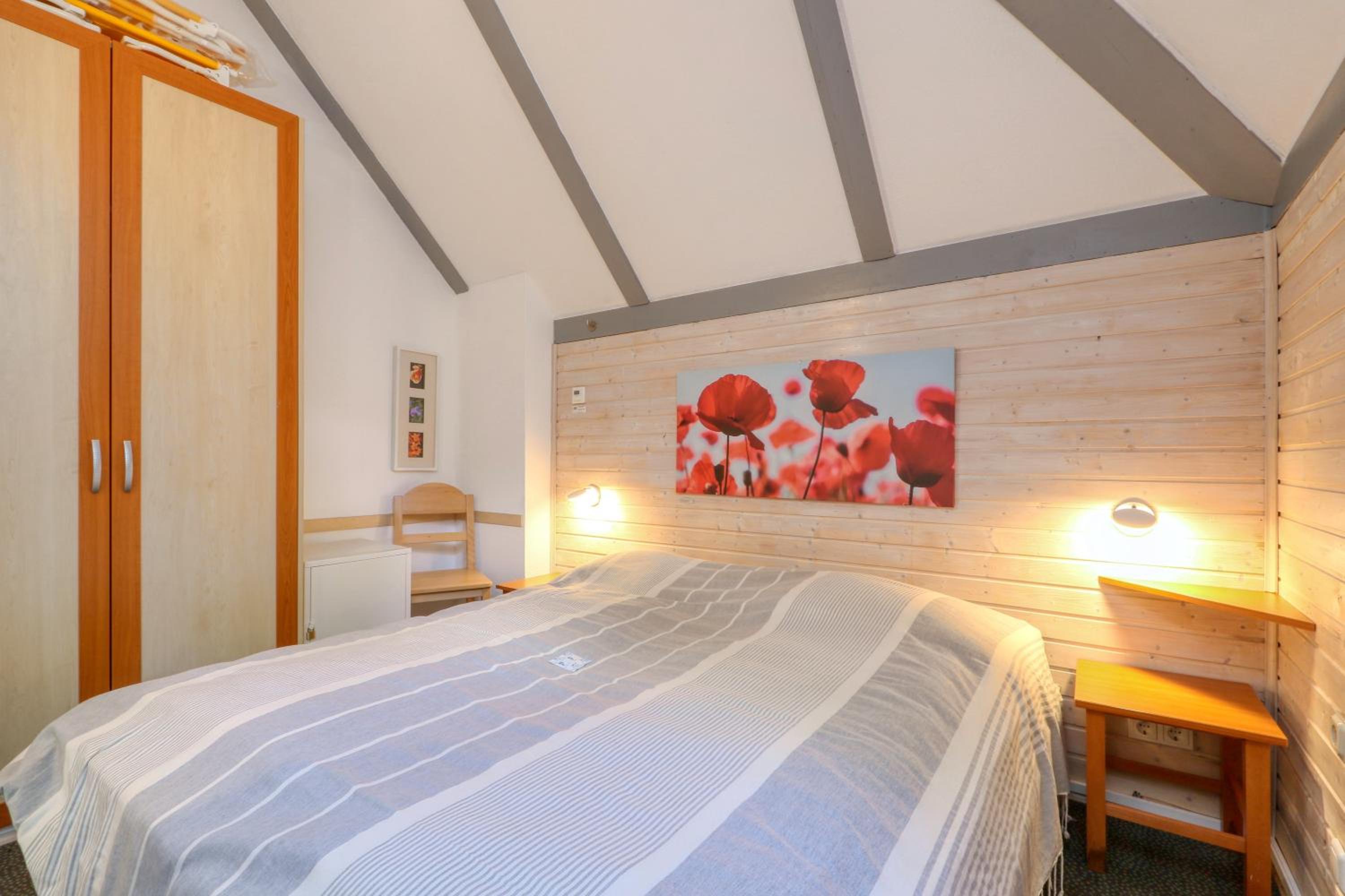 Ferienhaus 22 mit Seeblick und Garten bis 6 Personen