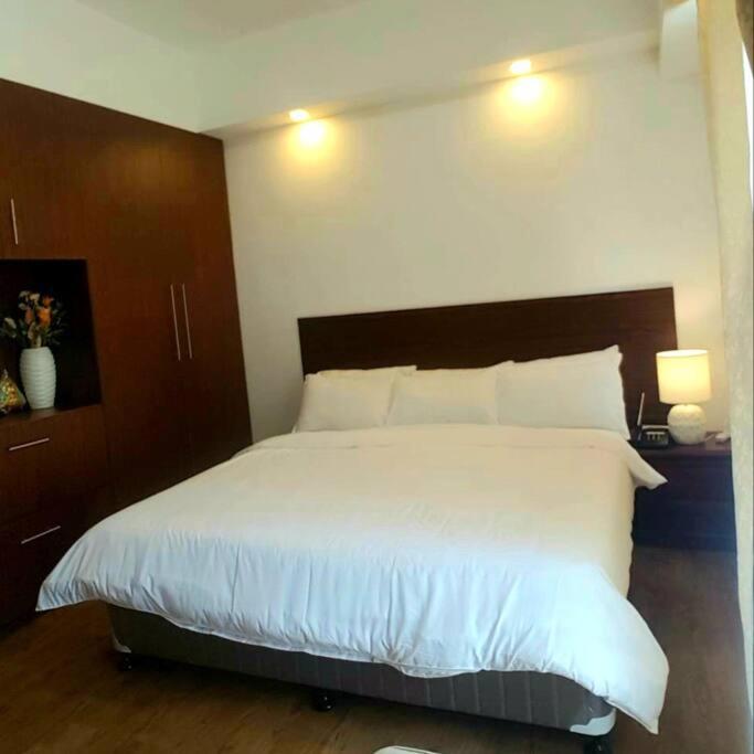 212B Amani Grand Resort Residences near Mactan Airport with pool, gym, wifi, netflix view 5