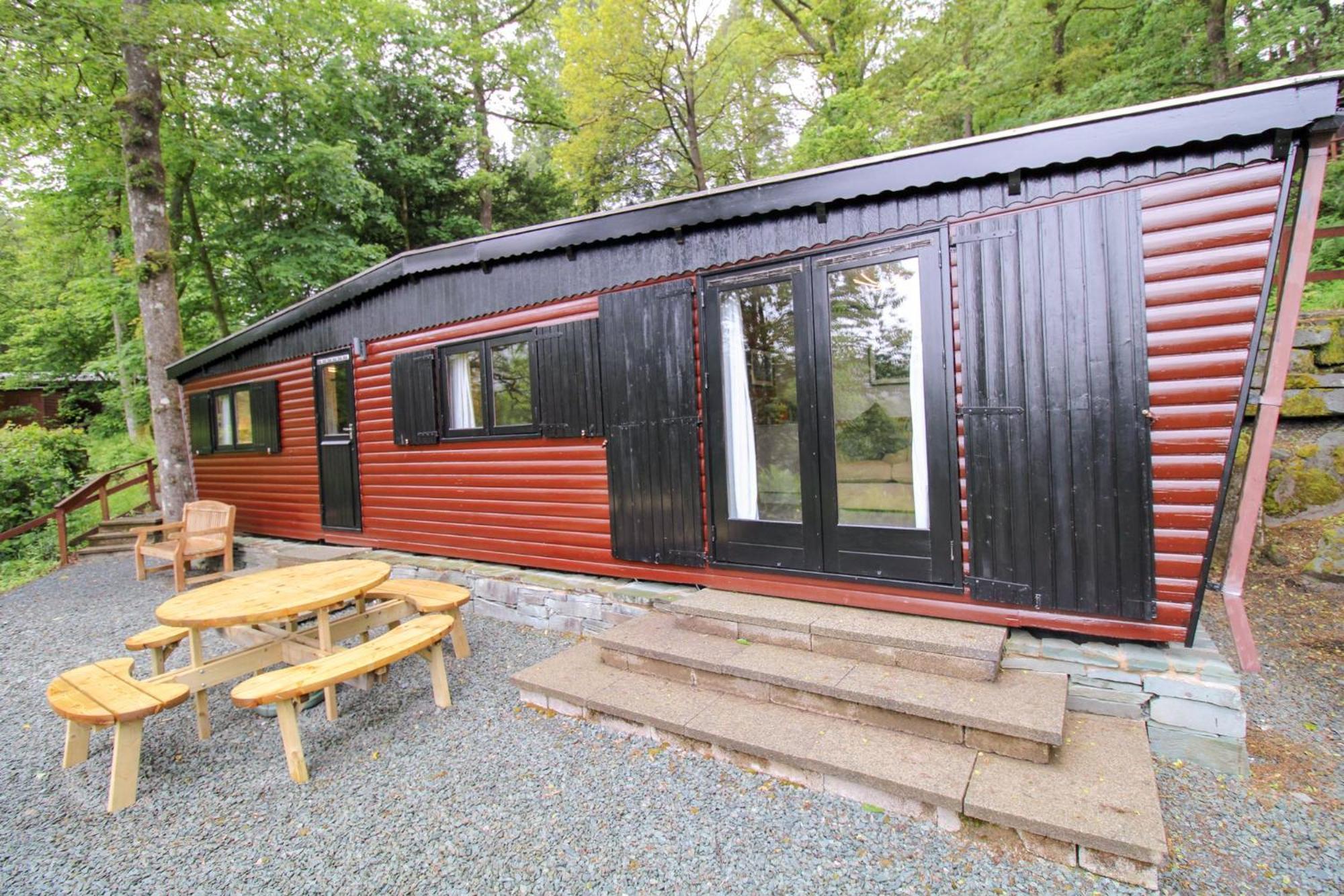 Neaum Crag Lodge ideal for a couple or family with young children in a woodland setting at Skelwith Bridge view 4