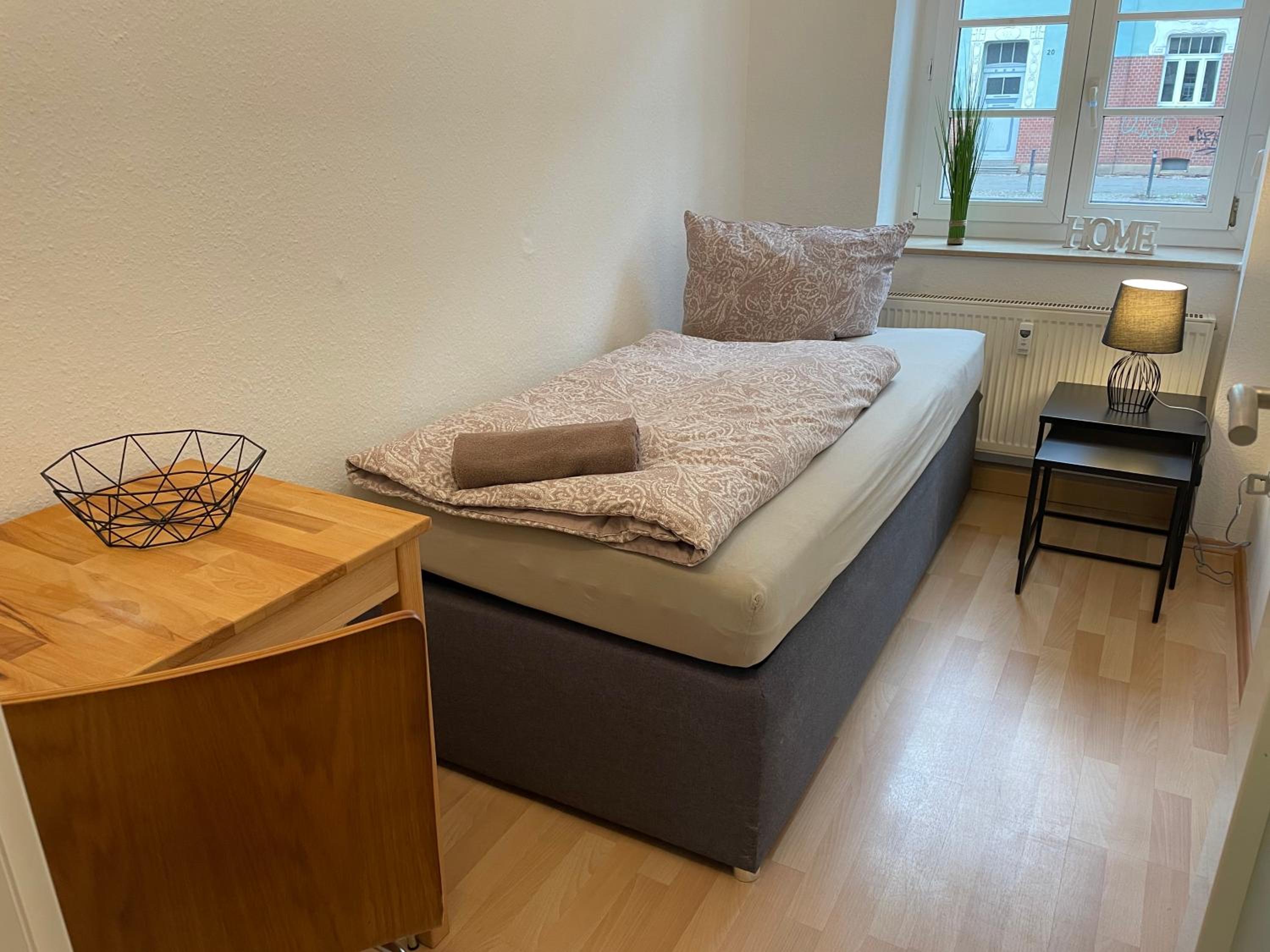Apartment Leipziger Straße - 3 Schlafzimmer - 4 Betten - Balkon - gratis Stellplatz - SmartTV