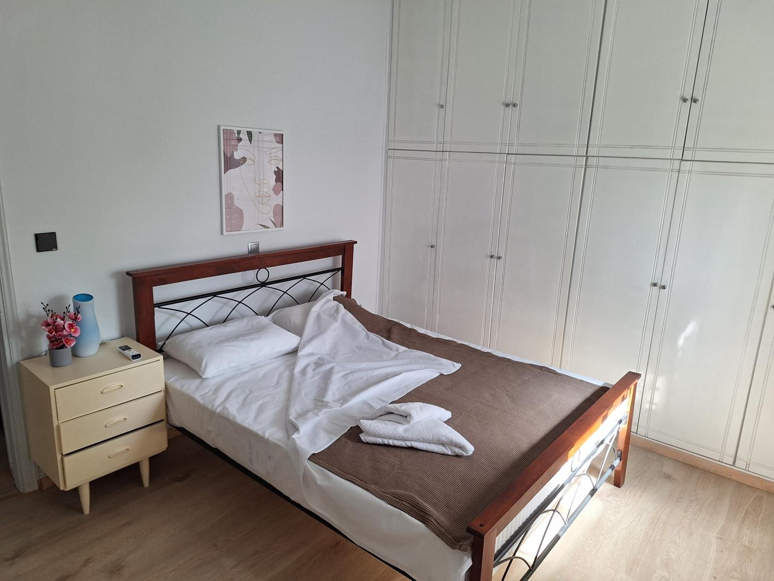 Di suite en Artemida — bedroom