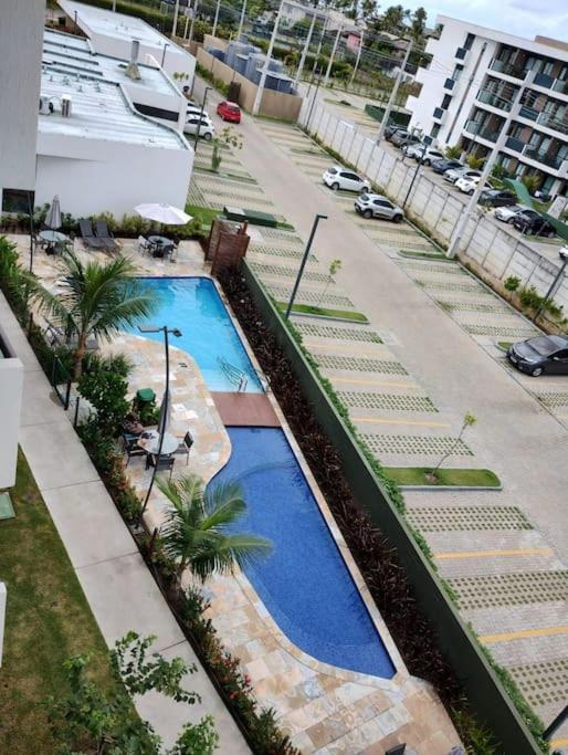 Muro Alto Makia • Vista Piscina • Luxo