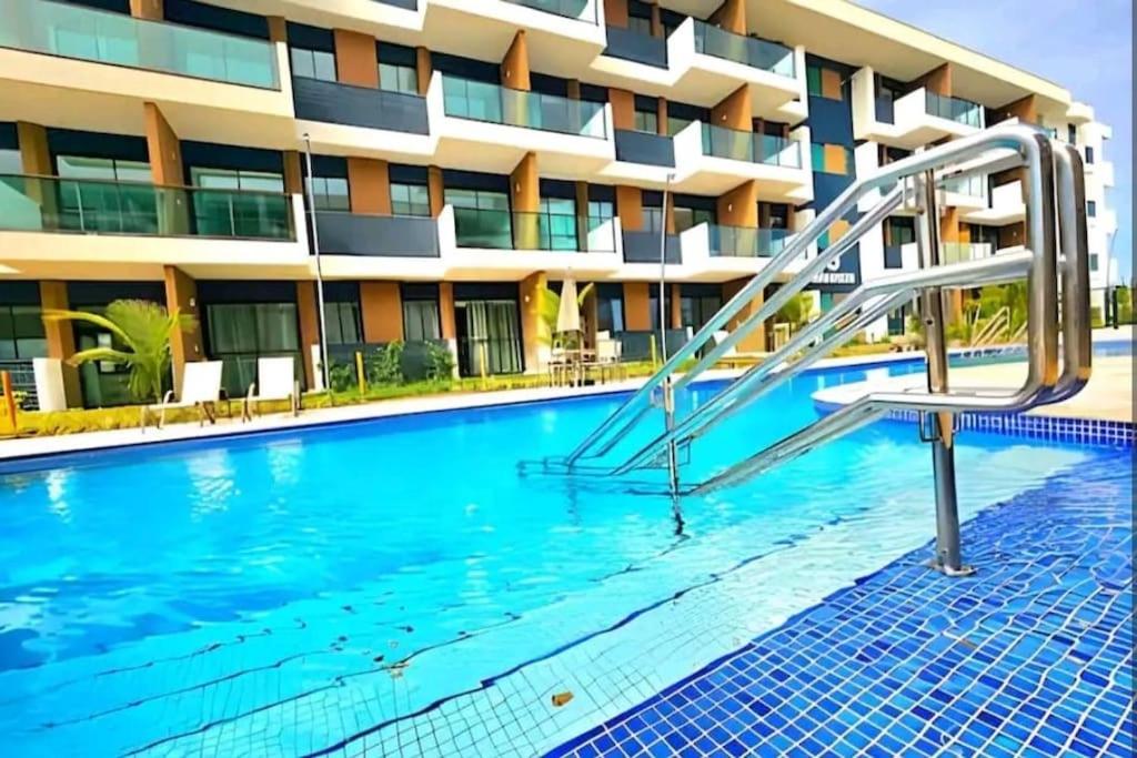 Muro Alto Makia • Vista Piscina • Luxo