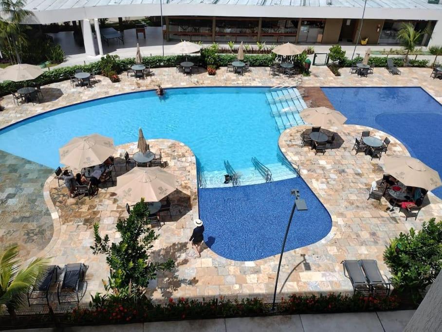 Muro Alto Makia • Vista Piscina • Luxo