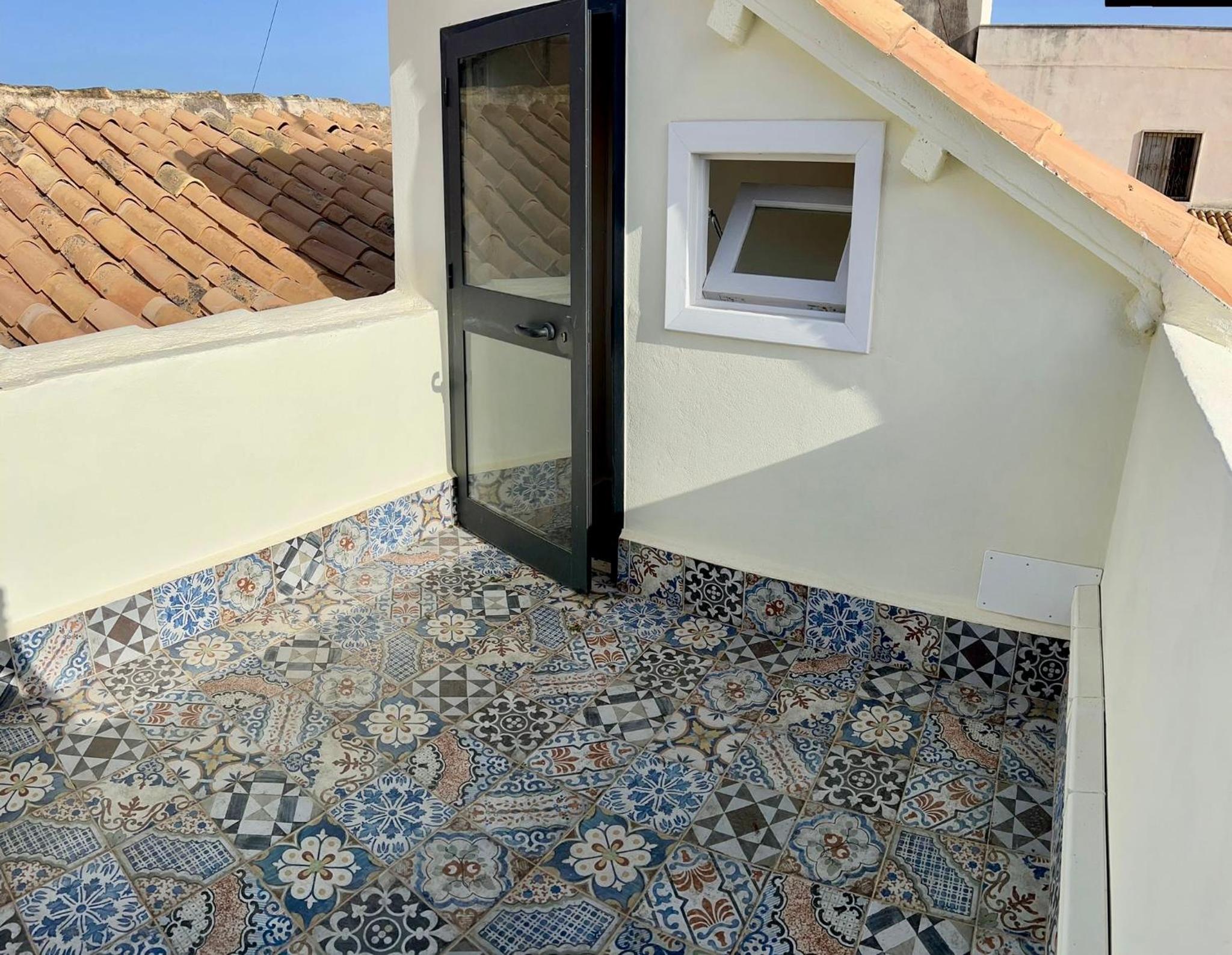 Incantevole appartamento in palazzo storico Ortigia