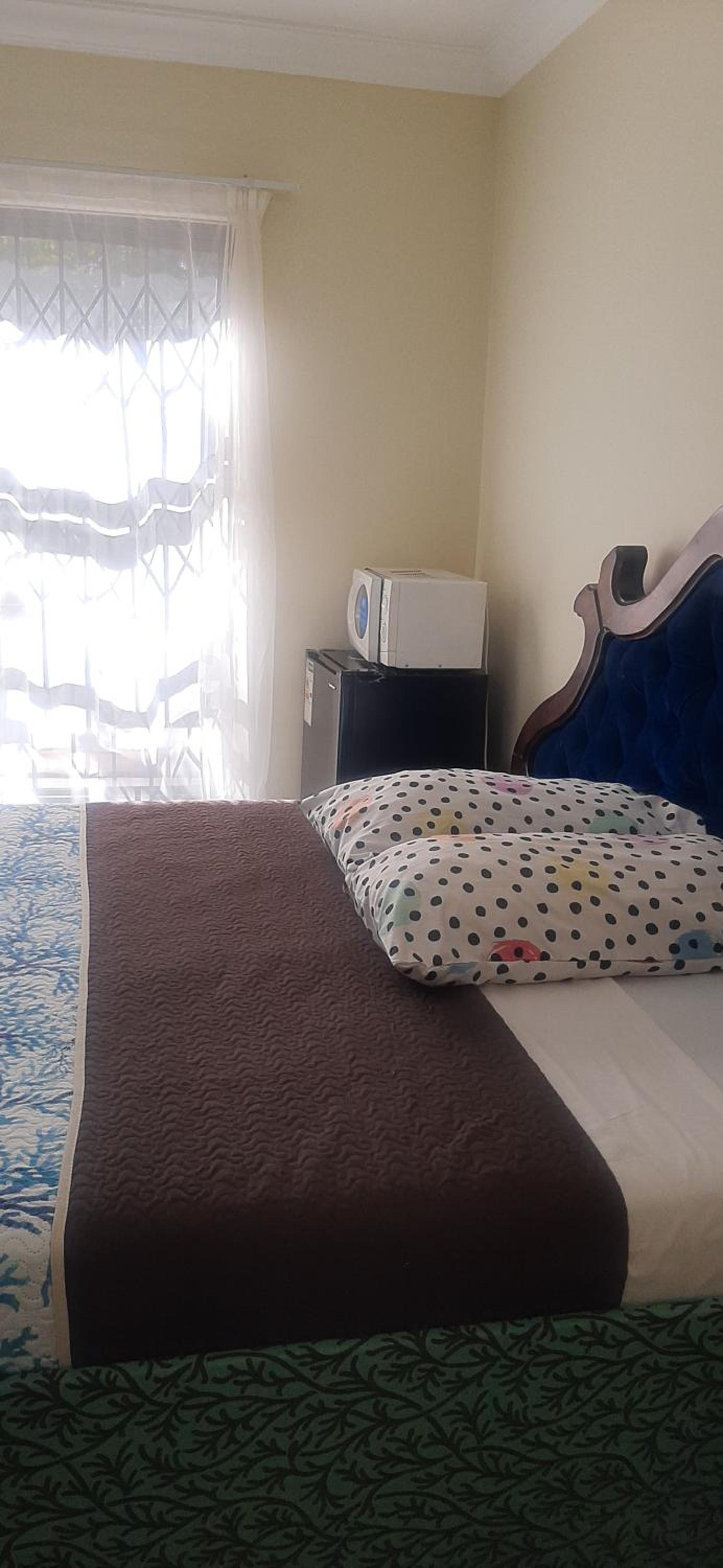 Alpha inn guest house accommodation view 4