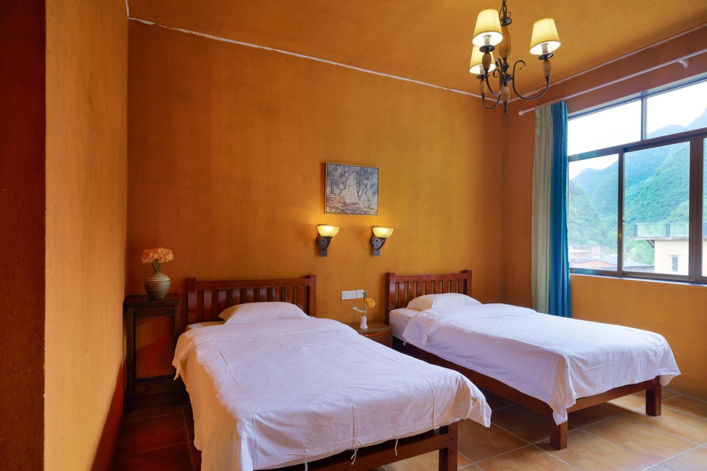 Yangshuo Eden's Social Guesthouse - Wake up to a hearty Western breakfast & fresh craft coffee & night beers & outdoor activities
