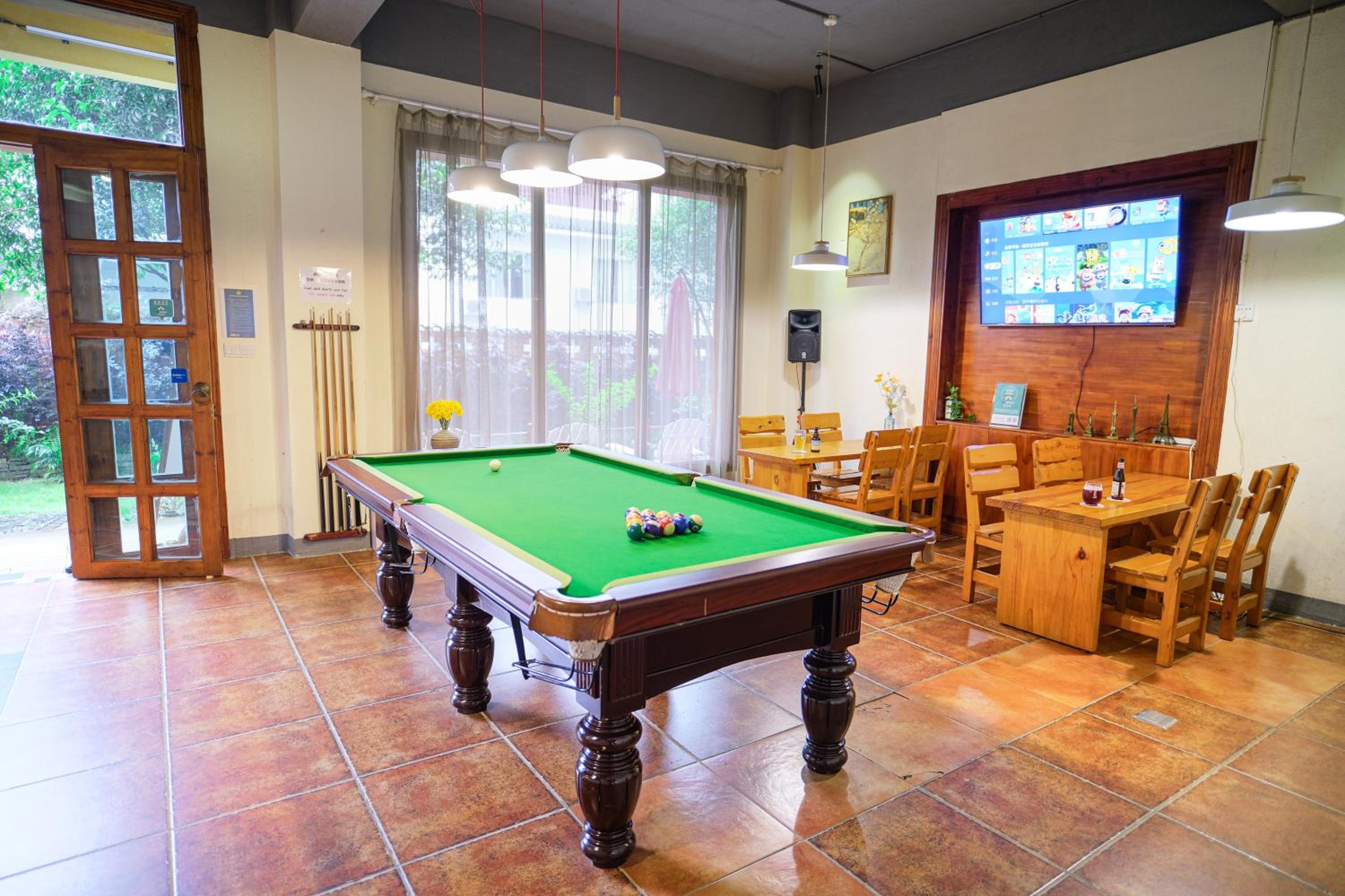 Yangshuo Eden's Social Guesthouse - Wake up to a hearty Western breakfast & fresh craft coffee & night beers & outdoor activities