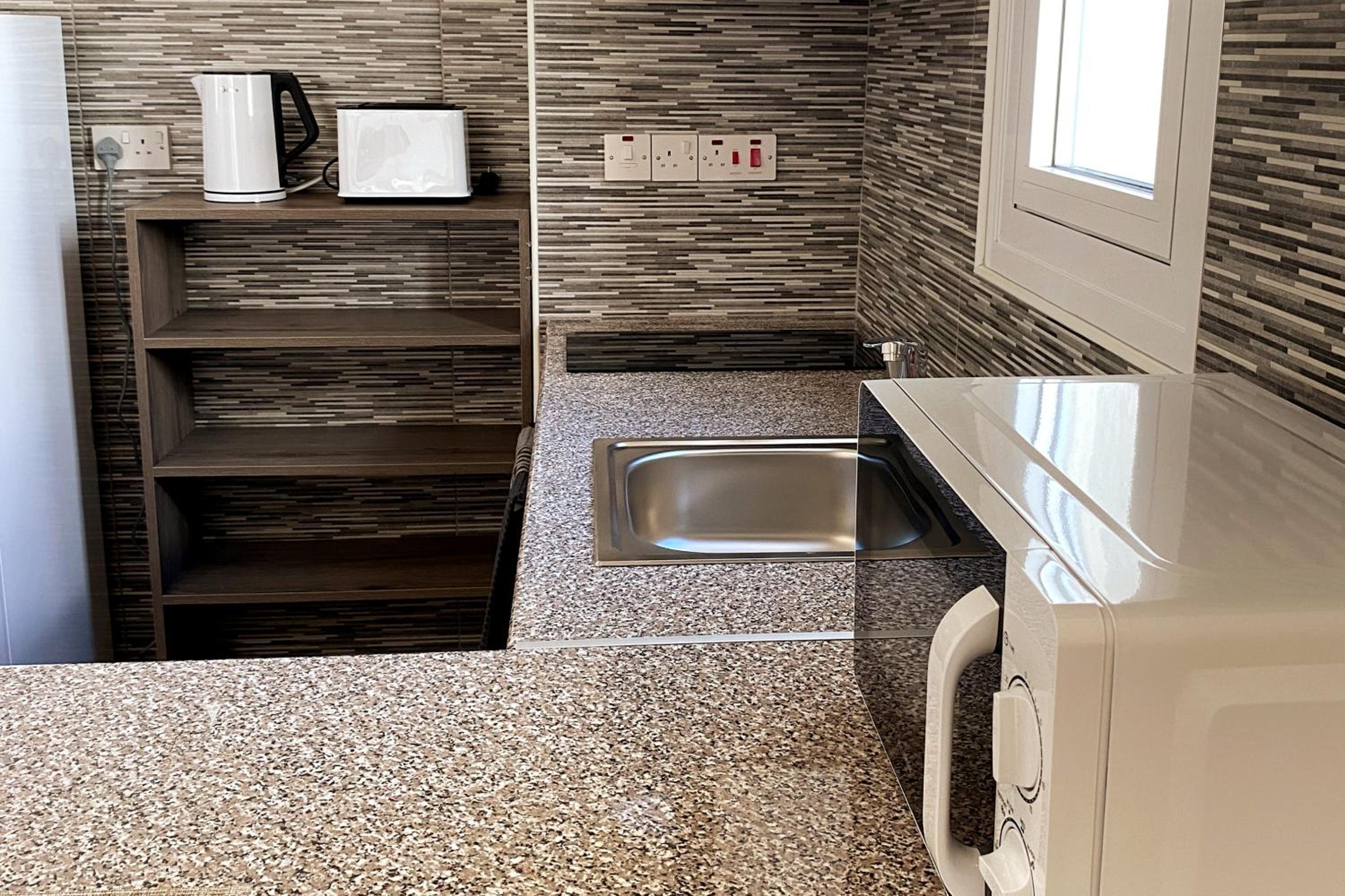 Danaos Seaside Suite 101 with Pool in Tourist Area