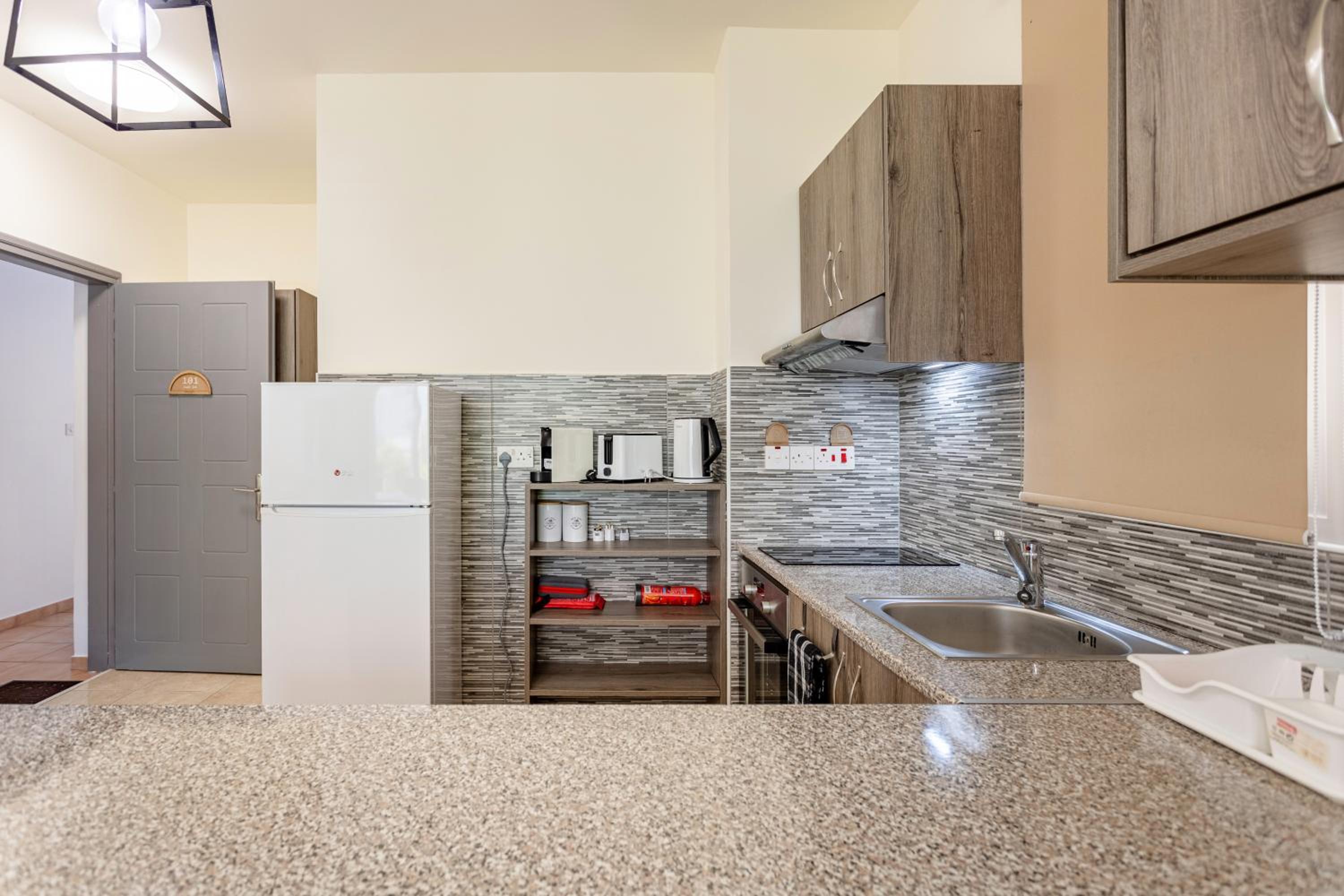 Danaos Seaside Suite 101 with Pool in Tourist Area