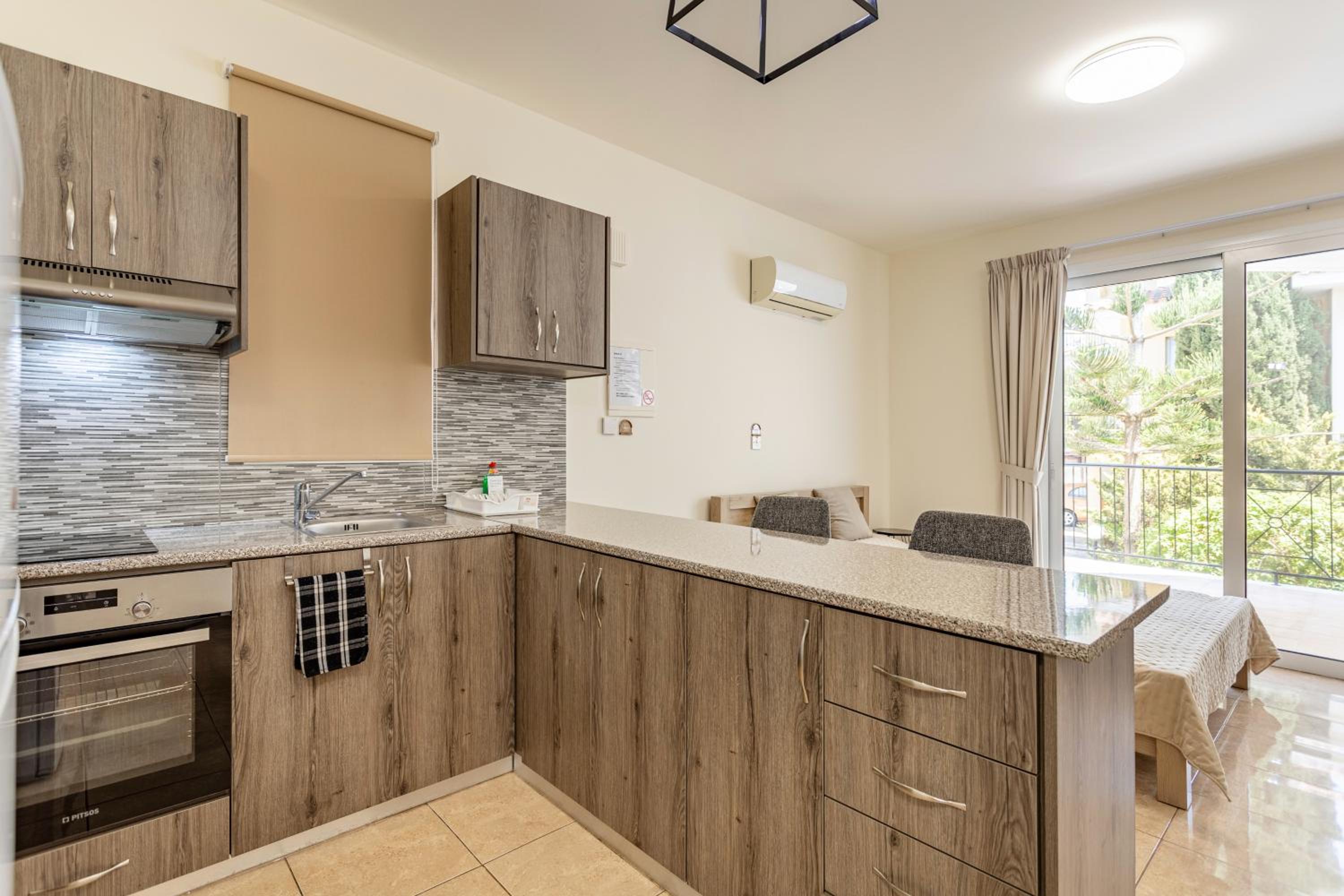 Danaos Seaside Suite 101 with Pool in Tourist Area