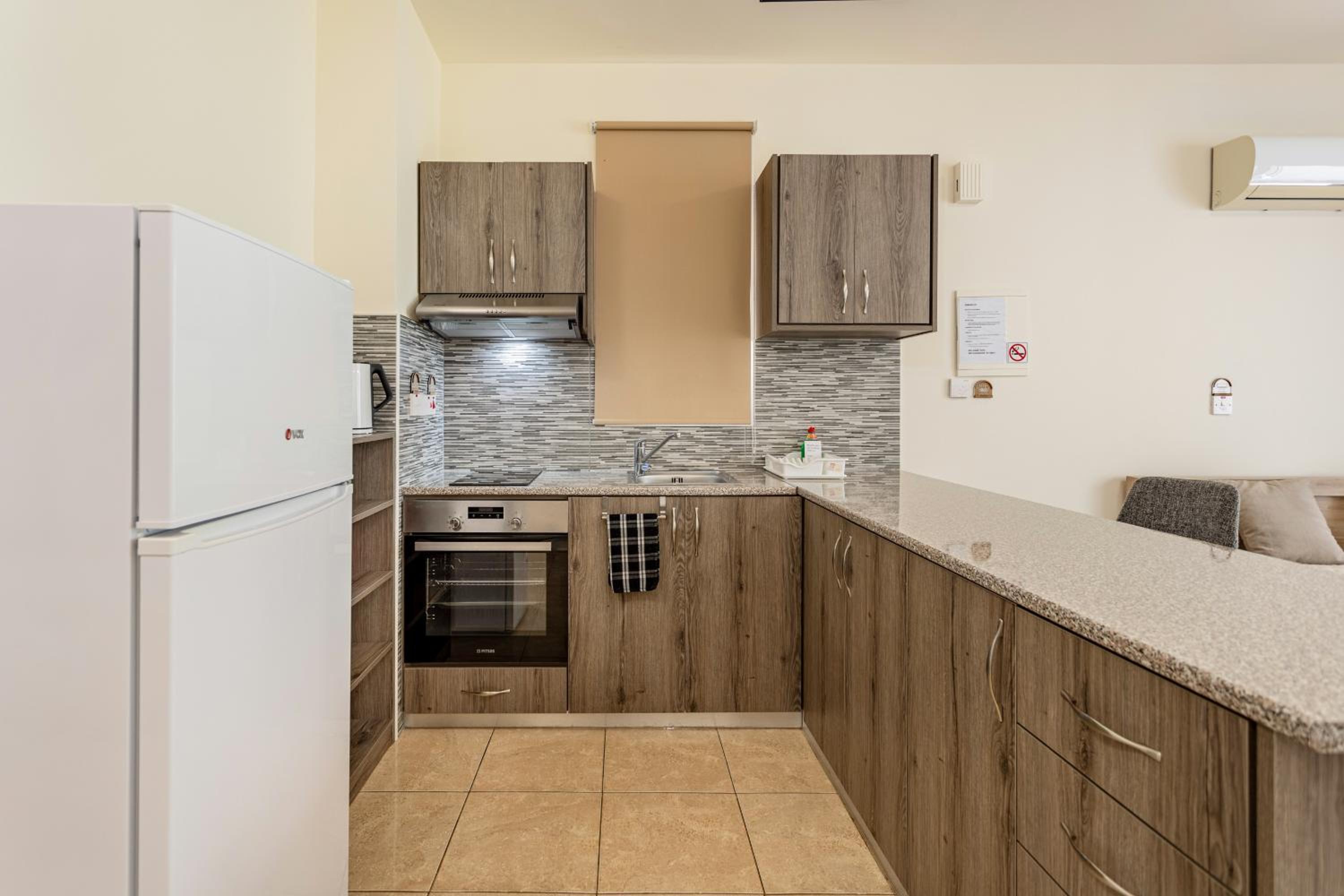 Danaos Seaside Suite 101 with Pool in Tourist Area