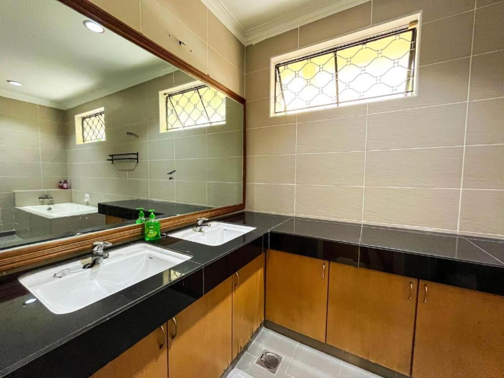 Bukit Tunku Grande Villa by uBook