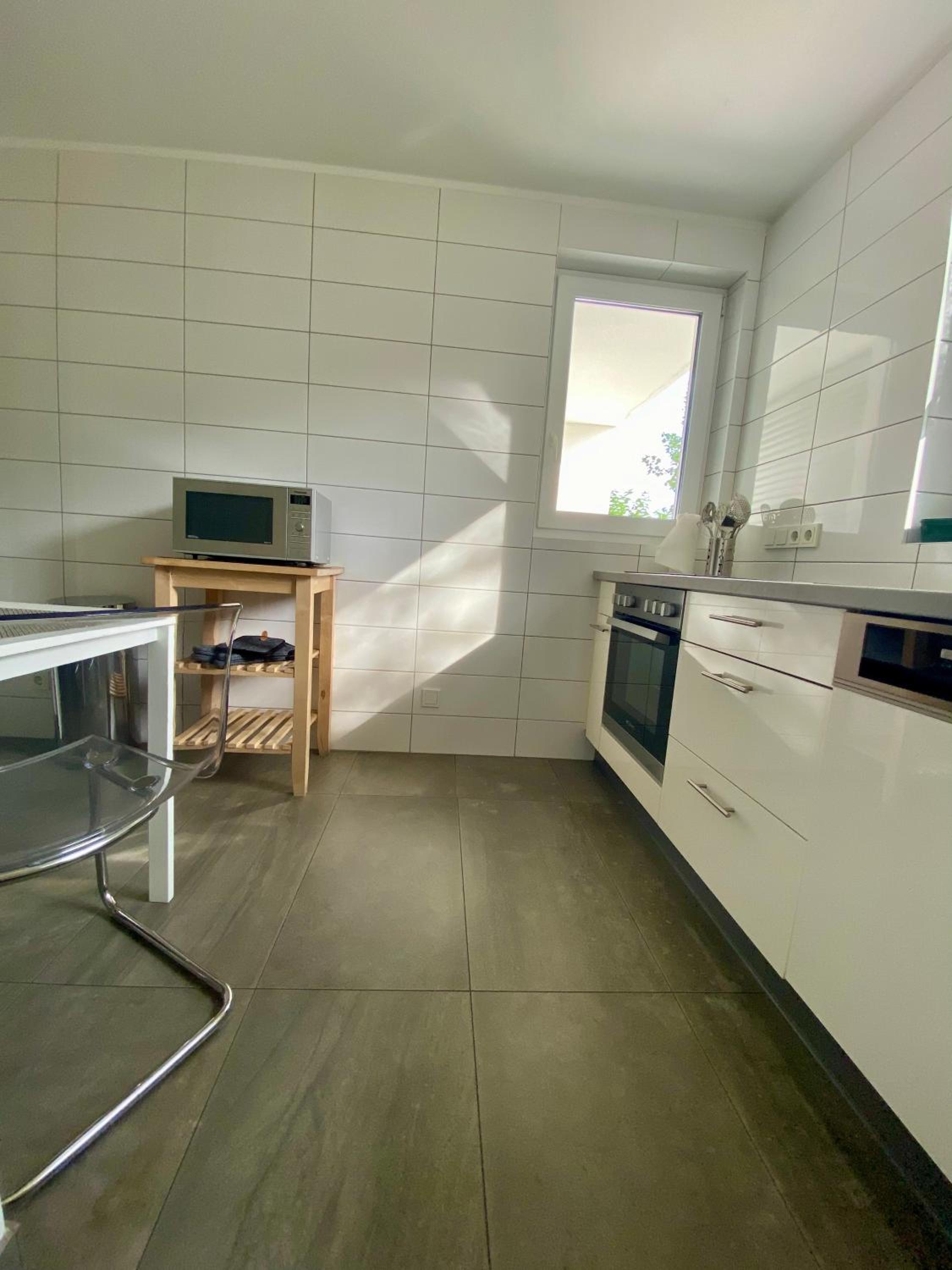 Modernes Ferienhaus mit 2 Balkonen, Terrasse und Garten !