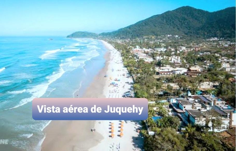 Flat em Juquehy - Condomínio com portaria e com piscina próximo praia