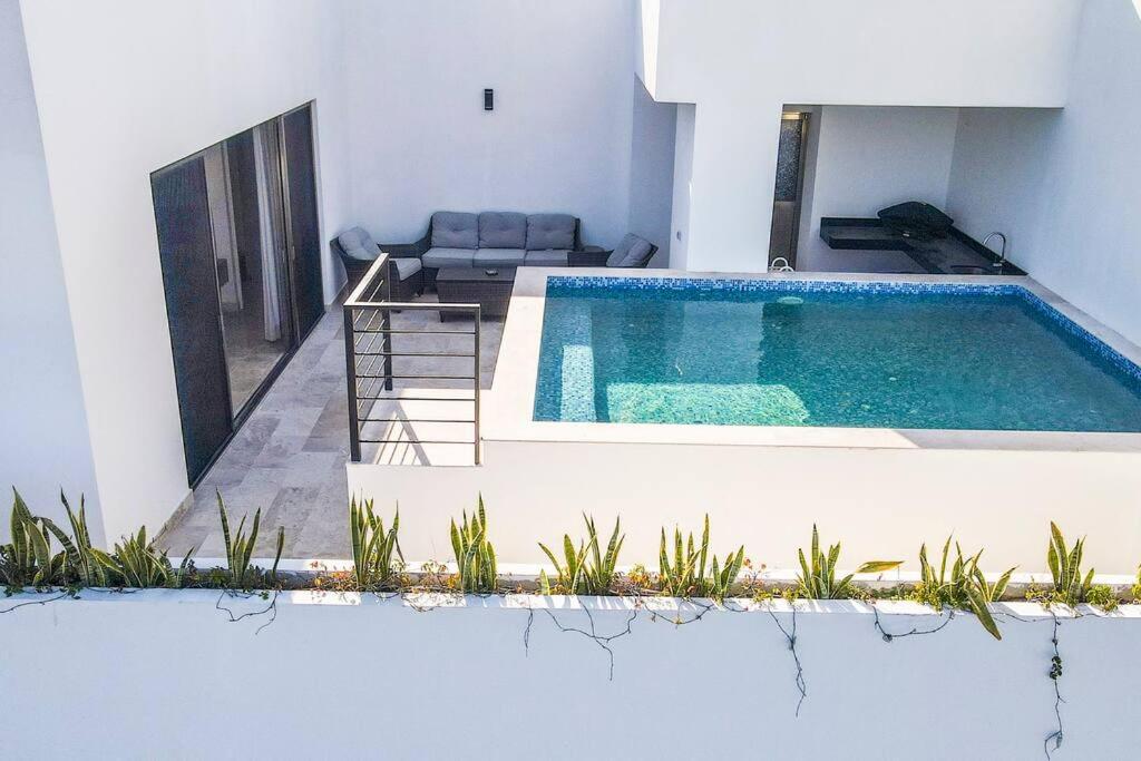 Luxe Penthouse with Rooftop Pool and Grill view 2