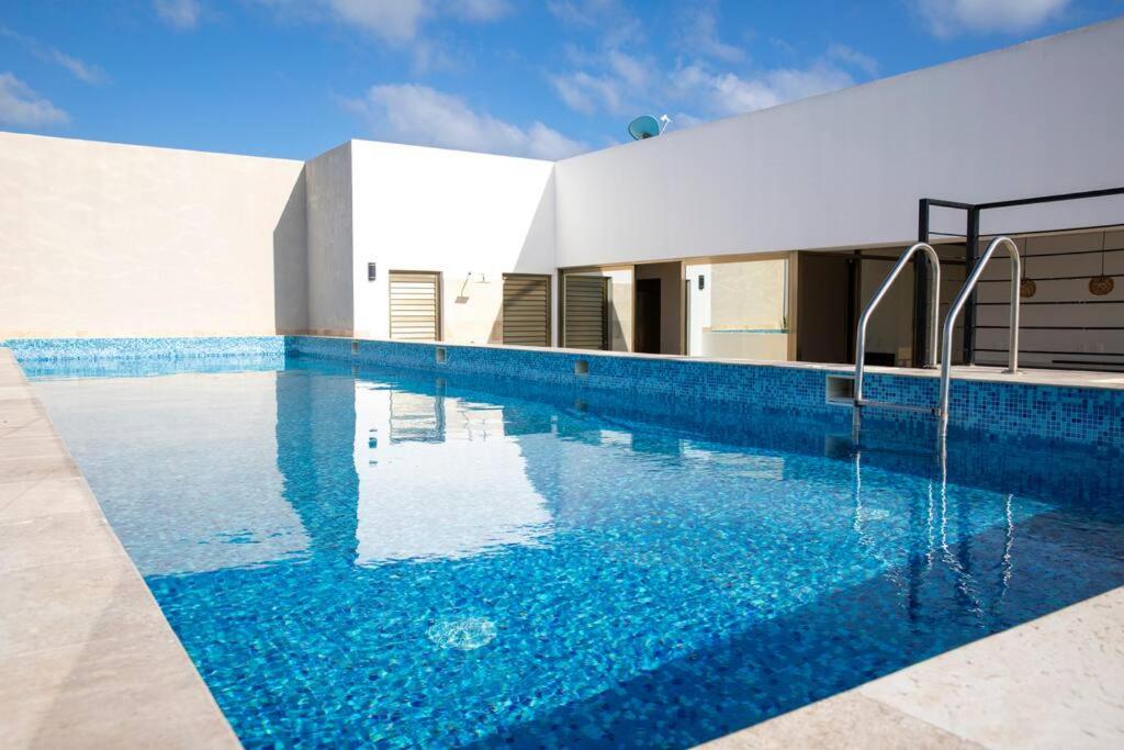 Luxe Penthouse with Rooftop Pool and Grill view 3