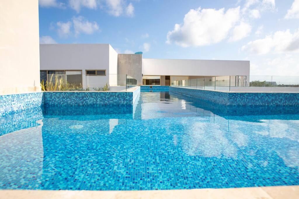 Luxe Penthouse with Rooftop Pool and Grill view 4
