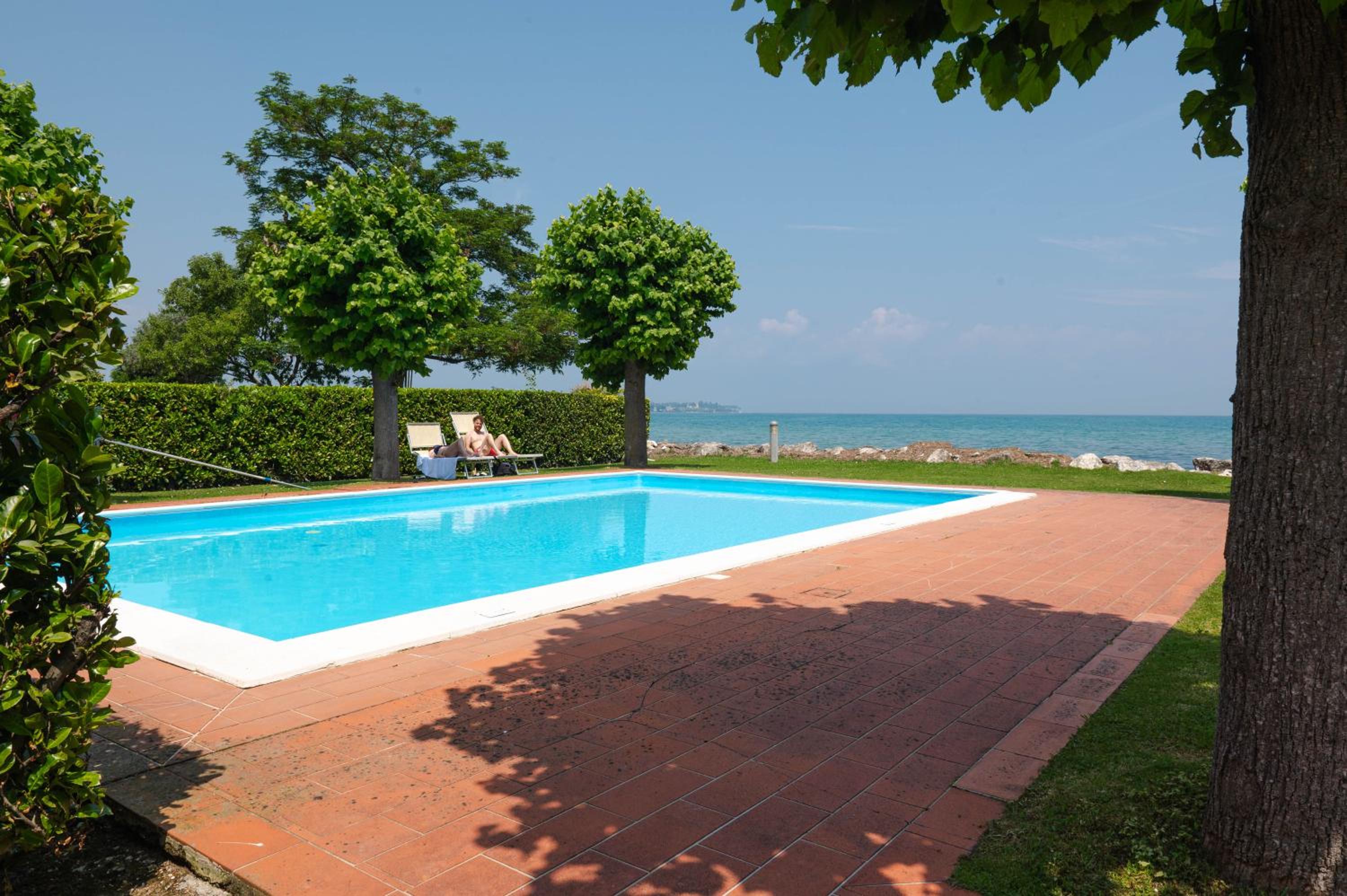 Timetofreedom Wohnung am Strand mit Pool
