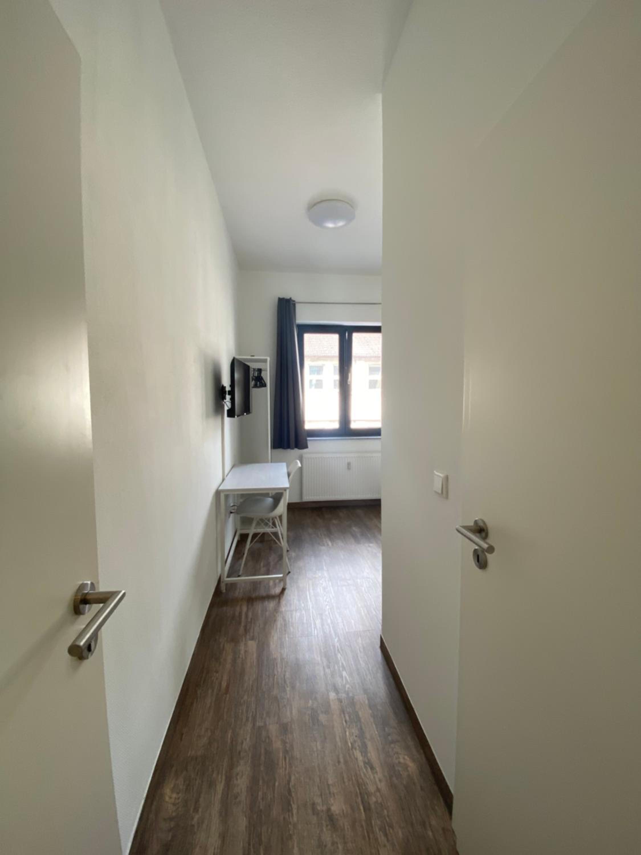 BIELEFELD CITY APARTMENTS - komfortable Einzelzimmer und Doppelzimmer - moderne Badezimmer, schnelles WLAN, Self-Check-In