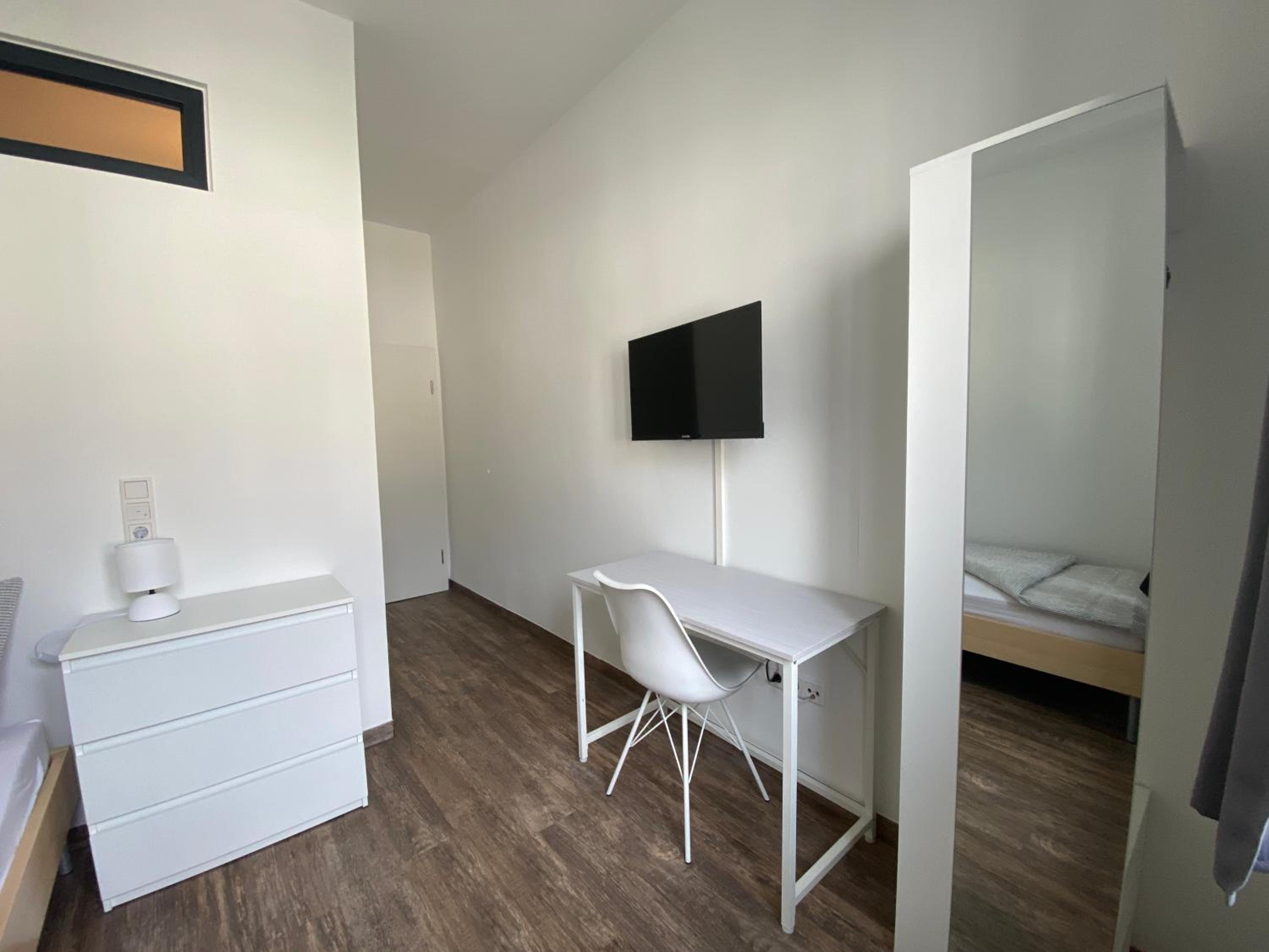 BIELEFELD CITY APARTMENTS - komfortable Einzelzimmer und Doppelzimmer - moderne Badezimmer, schnelles WLAN, Self-Check-In