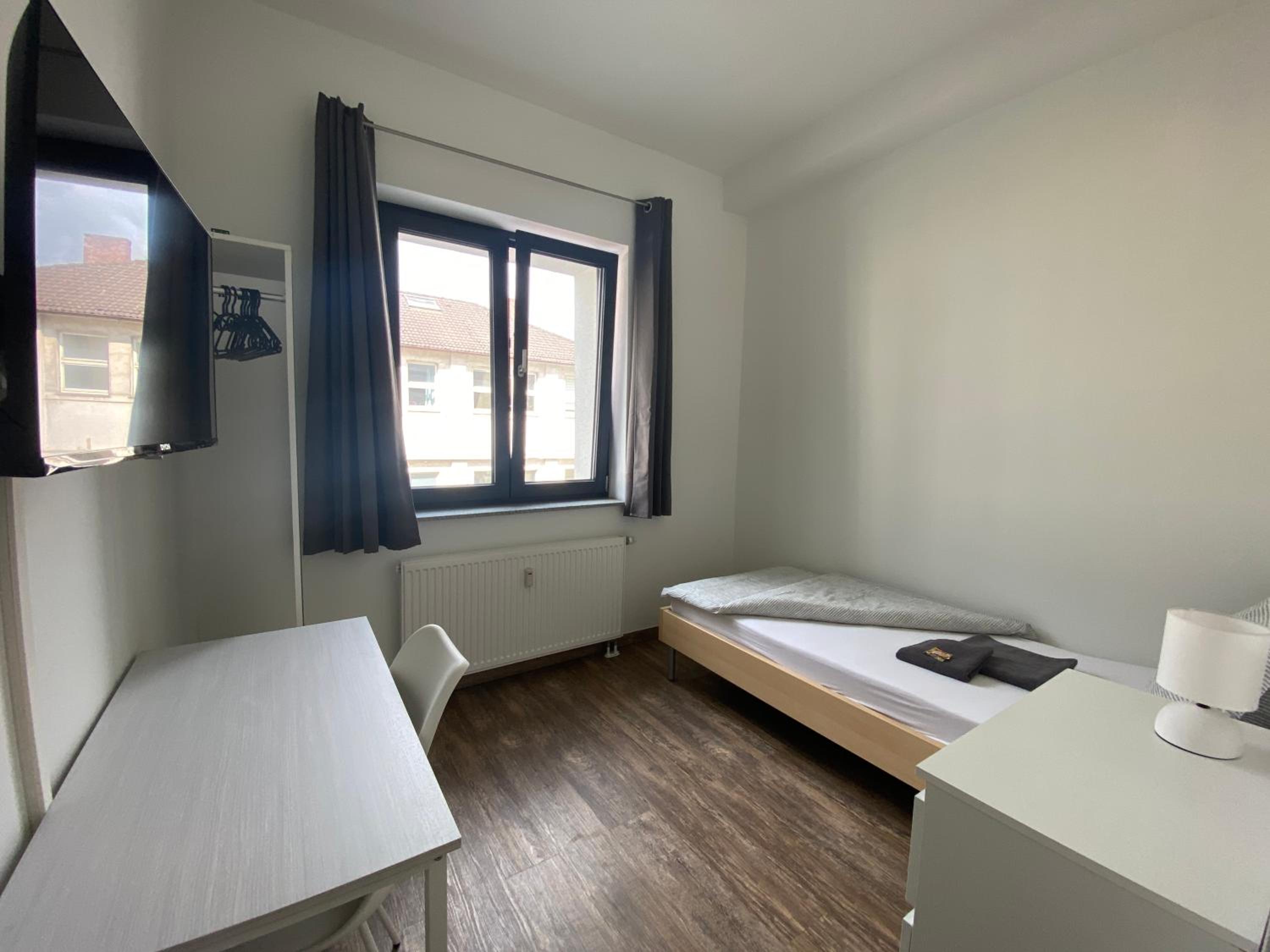 BIELEFELD CITY APARTMENTS - komfortable Einzelzimmer und Doppelzimmer - moderne Badezimmer, schnelles WLAN, Self-Check-In