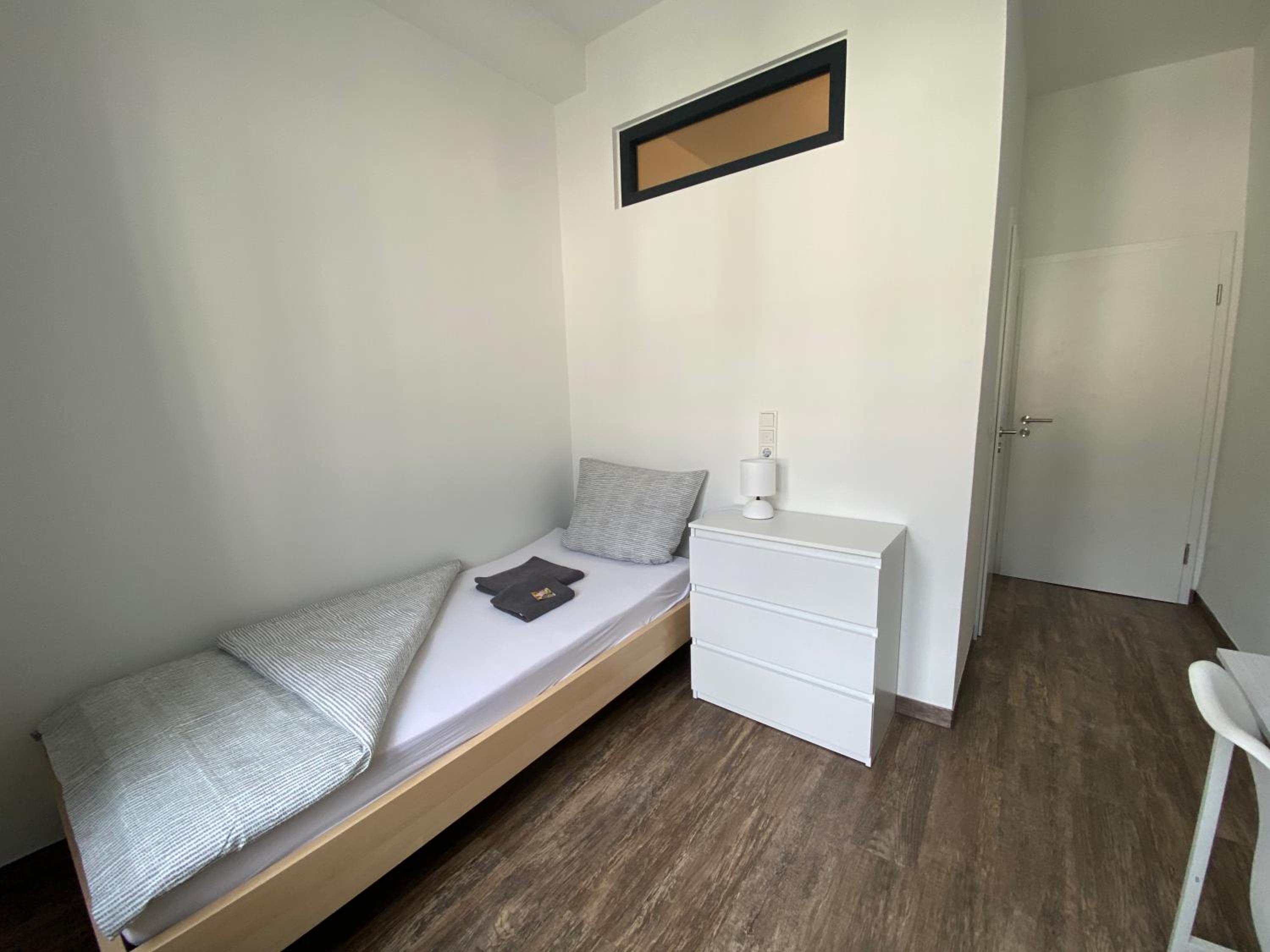 BIELEFELD CITY APARTMENTS - komfortable Einzelzimmer und Doppelzimmer - moderne Badezimmer, schnelles WLAN, Self-Check-In