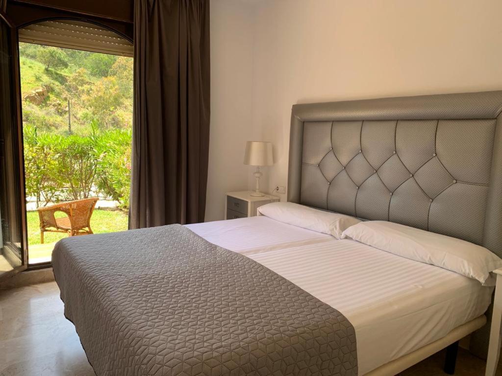 Hotel Apartamento de dos dormitorios y un baño con jardines cercano a la playa - Image 1