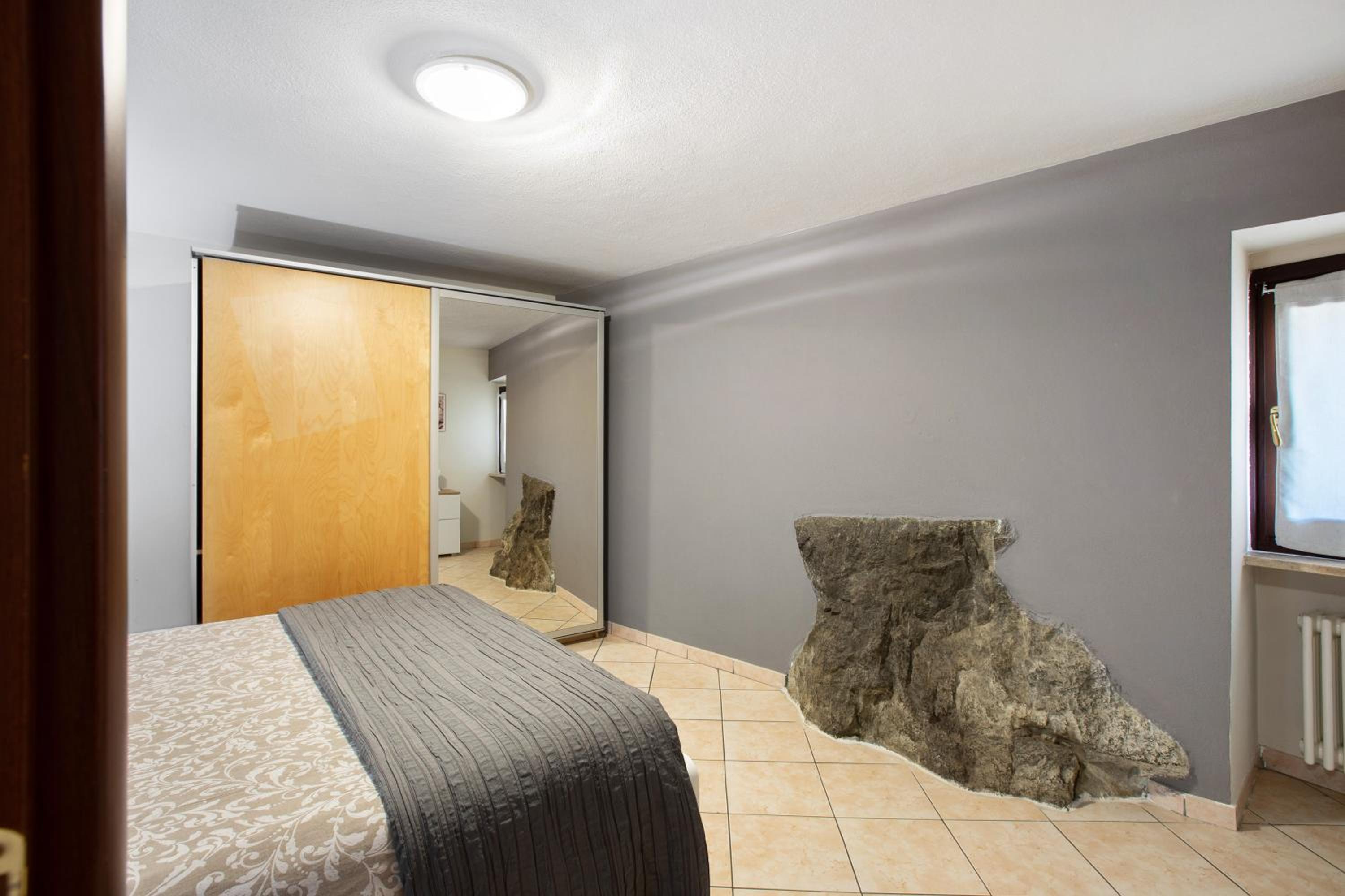 Maison Bebe Comboé en Aosta — hotel room