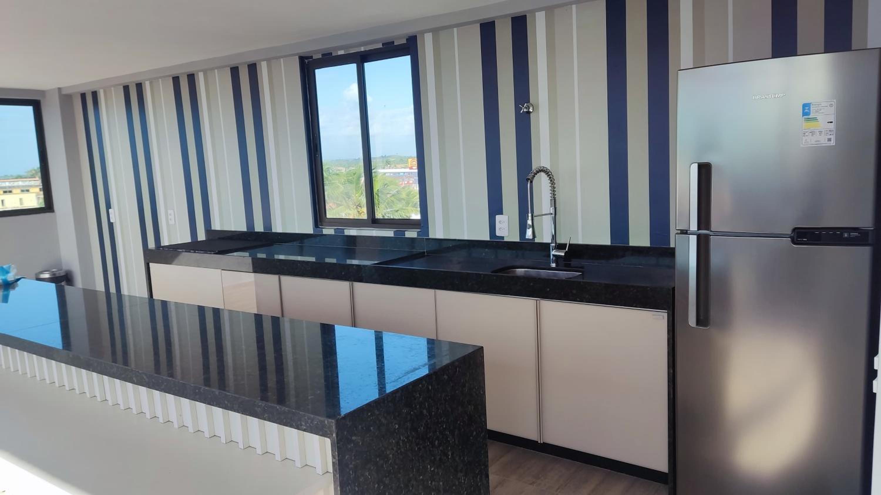 Flat completo com rooftop | perto da praia e centro