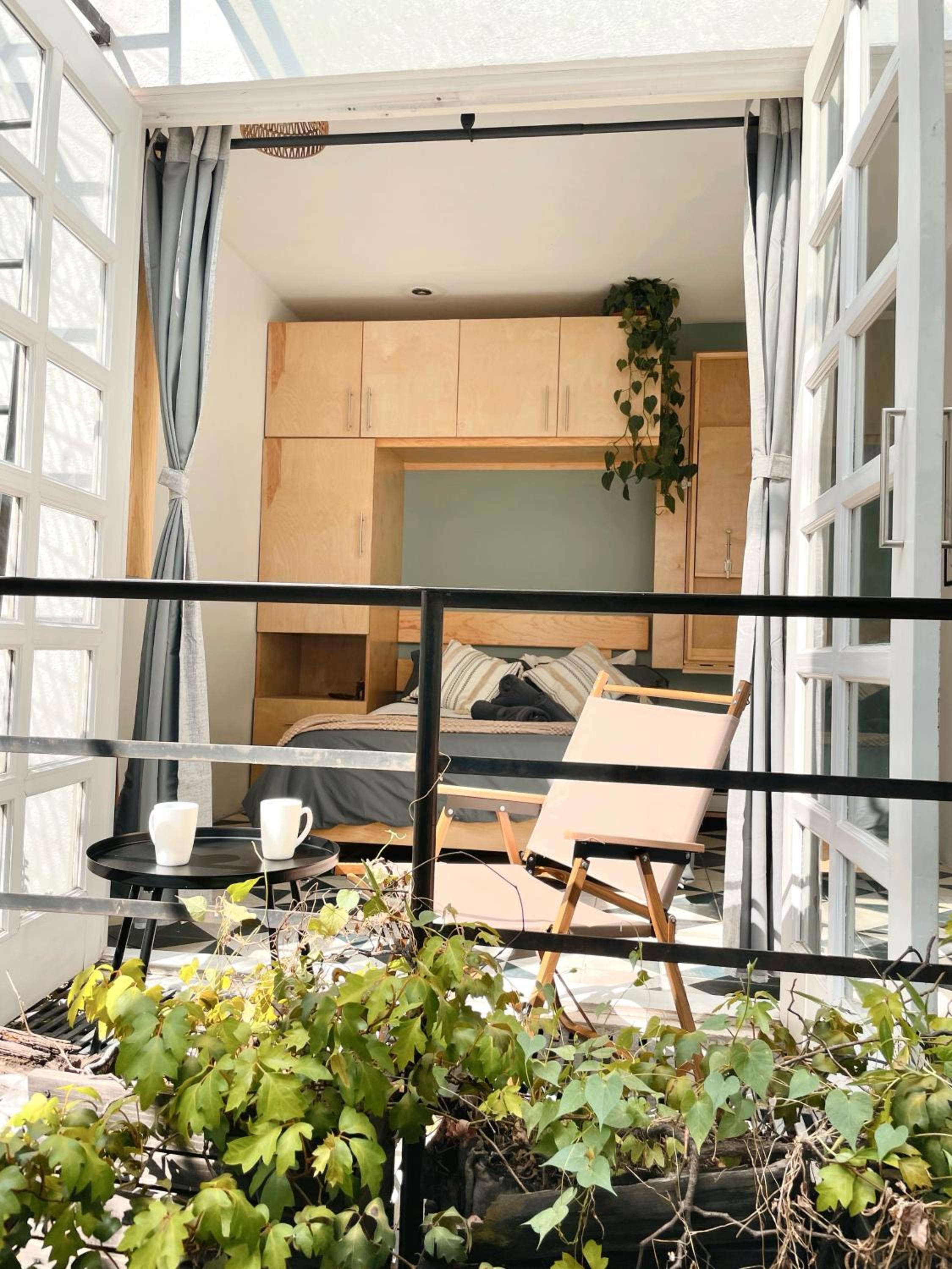 Sunlit Studio with Balcony and Workspace — Mexico City