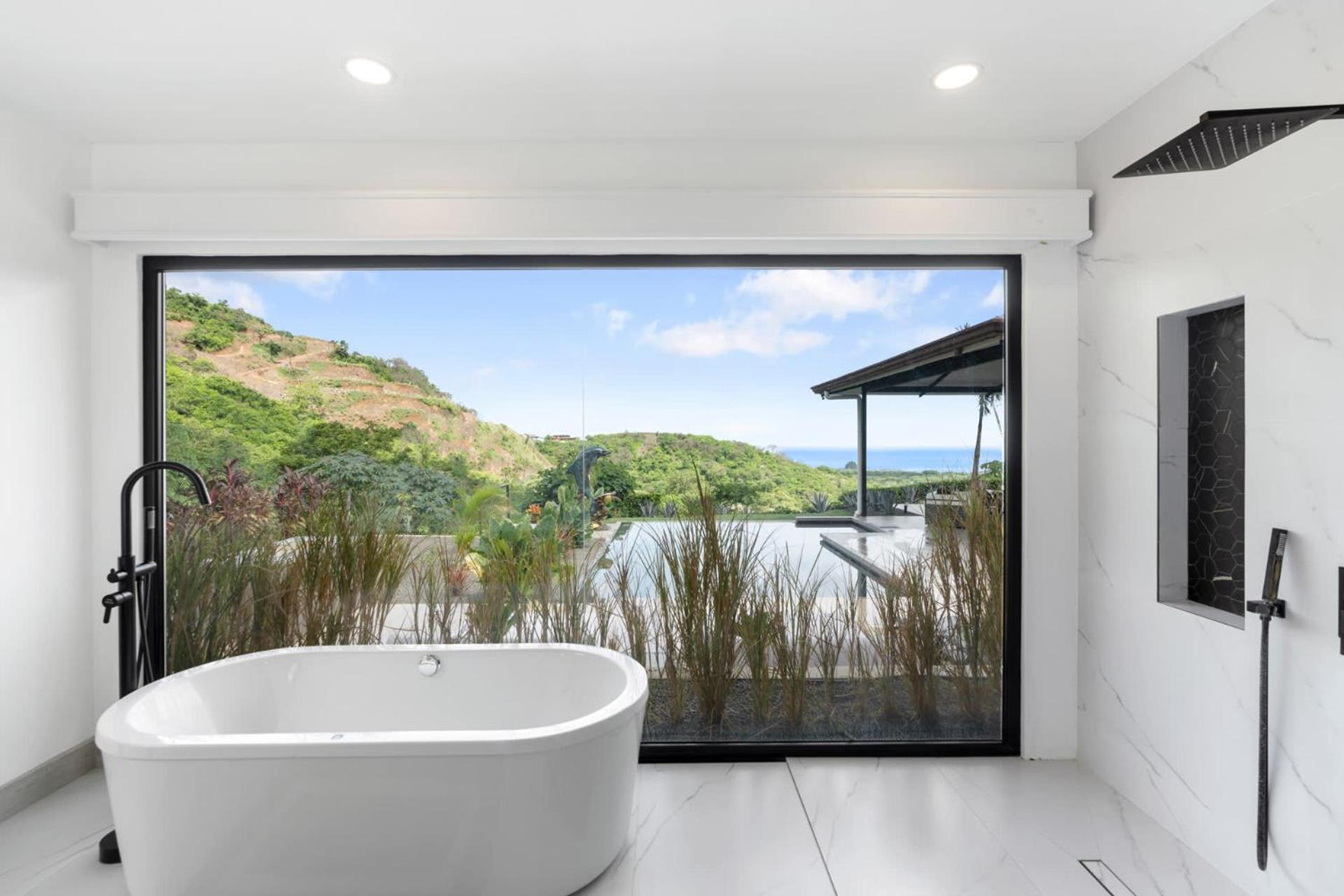 Luxe Tropical Villa with Sparkling Infinity Pool, Panoramic Ocean Views & Community Amenities