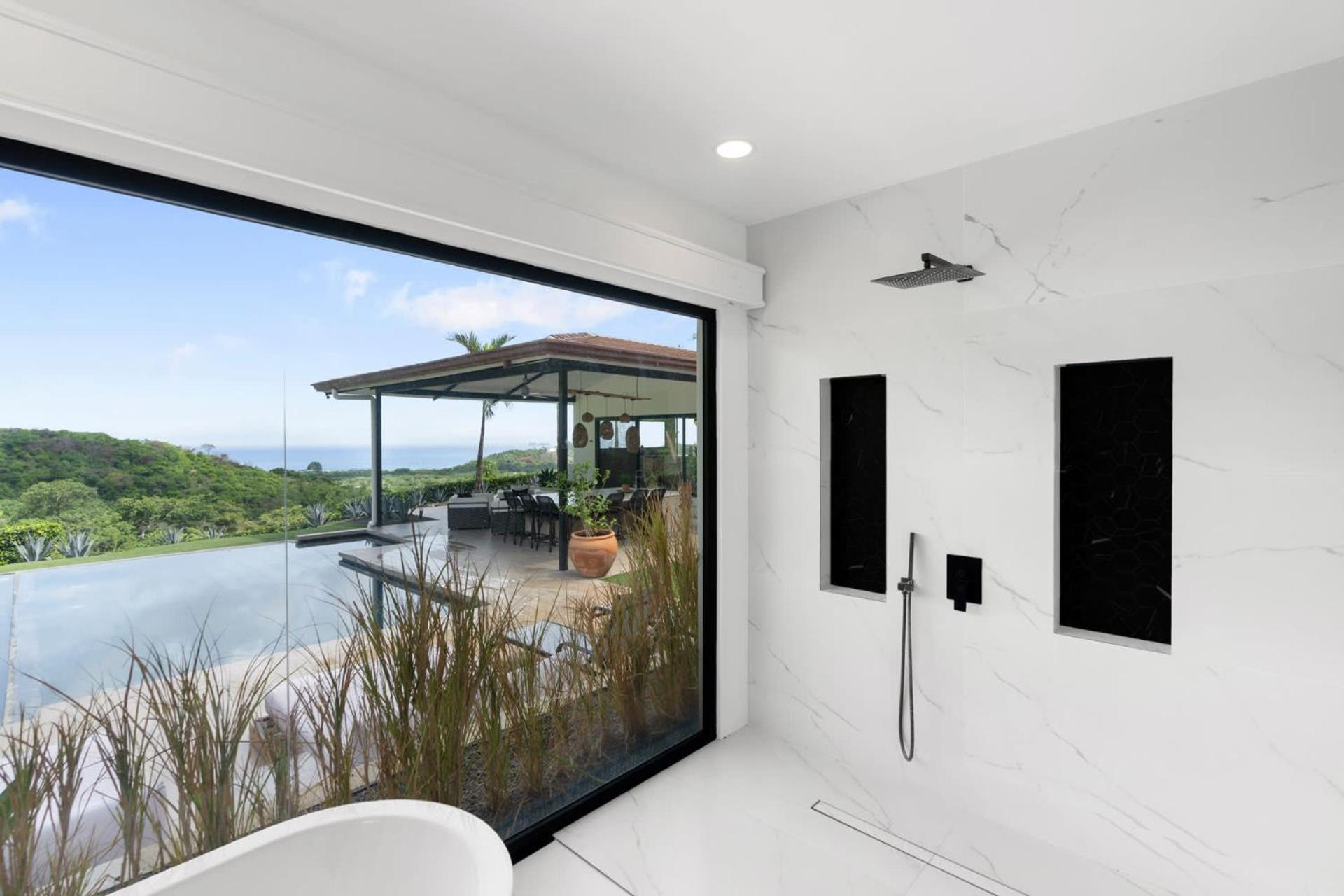 Luxe Tropical Villa with Sparkling Infinity Pool, Panoramic Ocean Views & Community Amenities