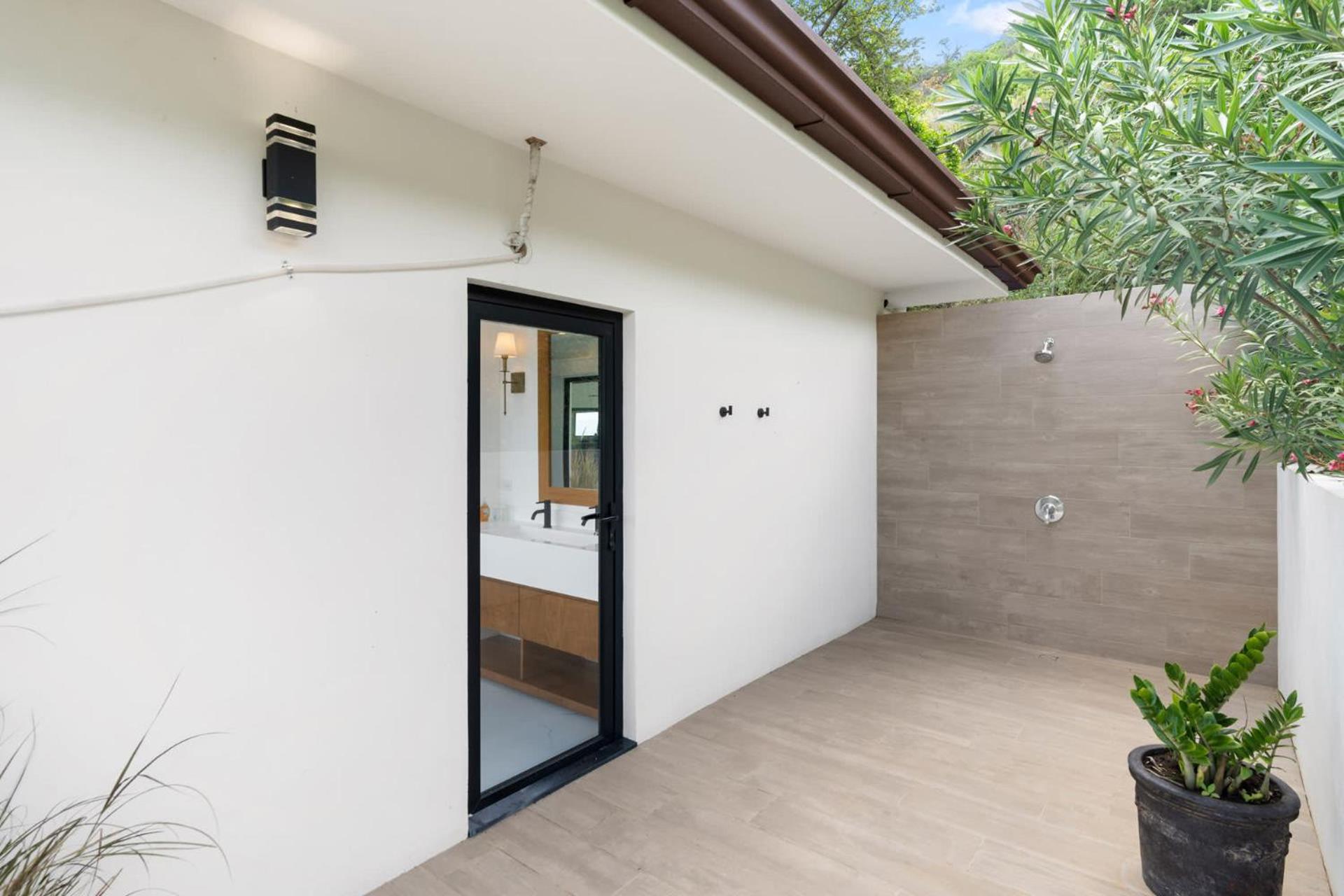 Luxe Tropical Villa with Sparkling Infinity Pool, Panoramic Ocean Views & Community Amenities