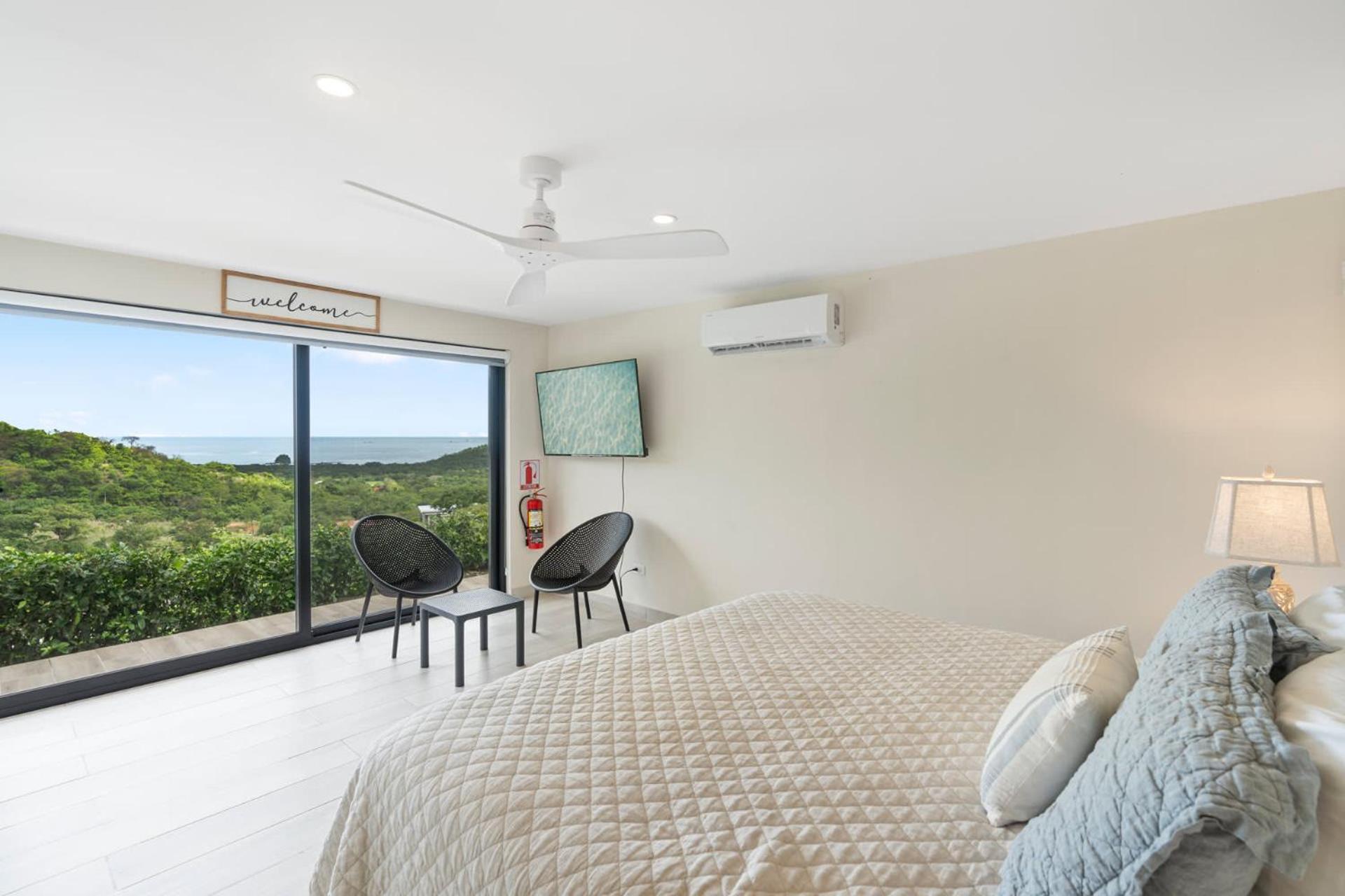 Luxe Tropical Villa with Sparkling Infinity Pool, Panoramic Ocean Views & Community Amenities