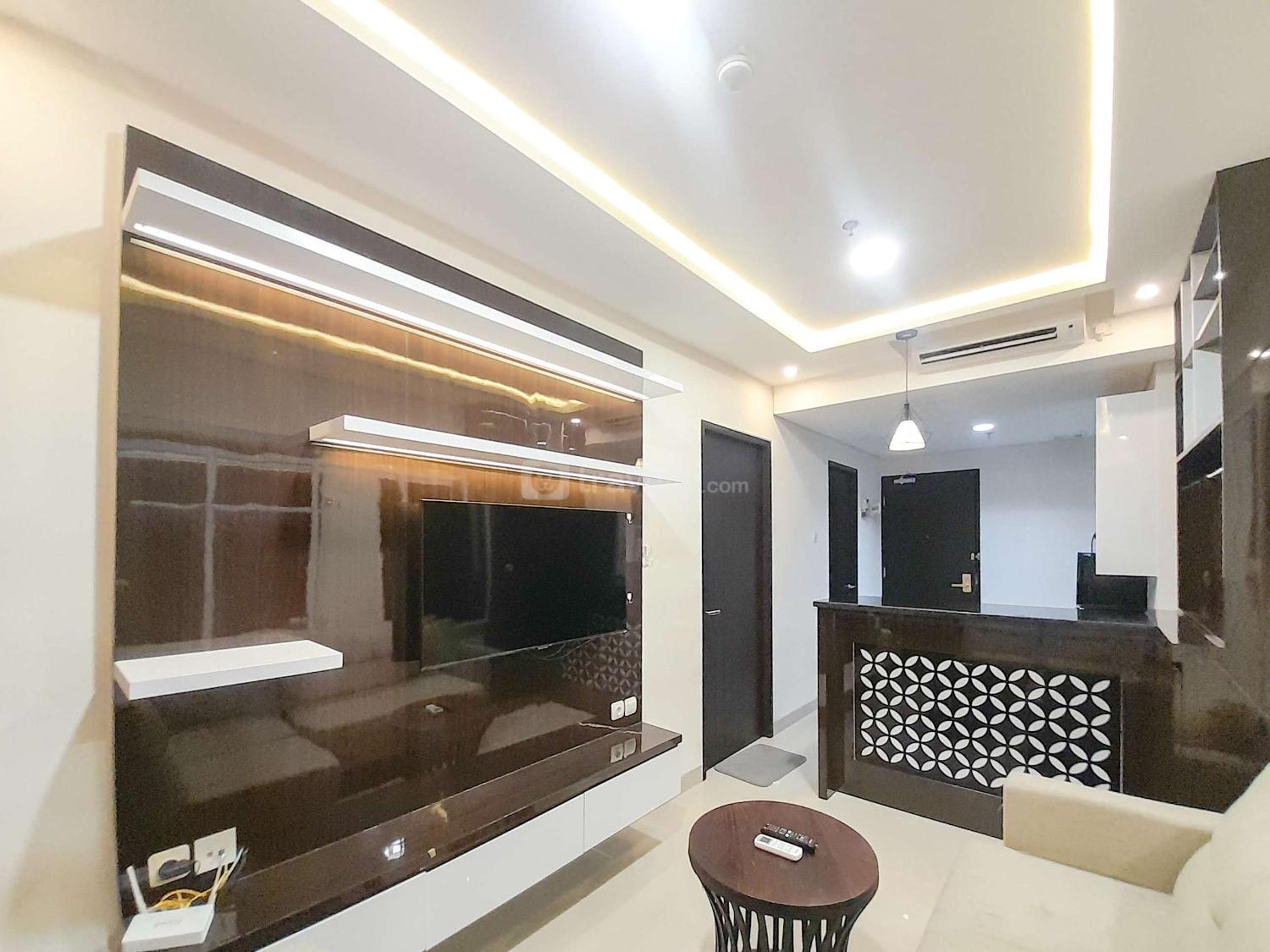 Spacious and Elegant 1BR at Patraland Amarta Apartment By Travelio