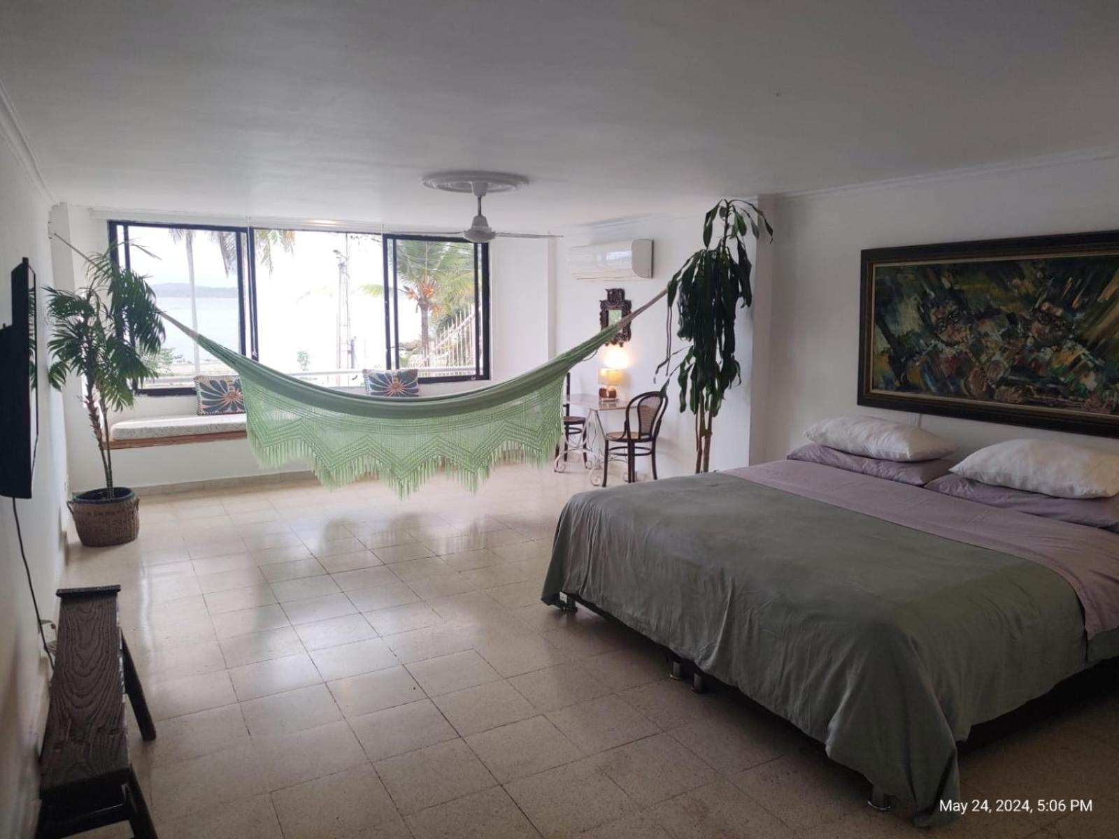 Habitación de lujo en hermosa casa frente al mar