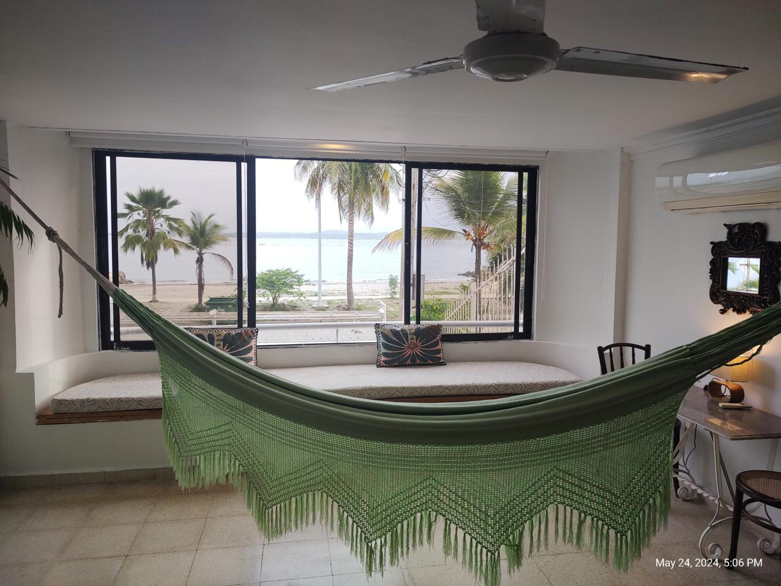 Habitación de lujo en hermosa casa frente al mar