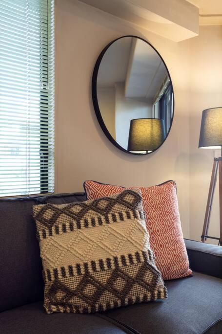 Spacious 1-bedroom unit in CBD with free parking view 2