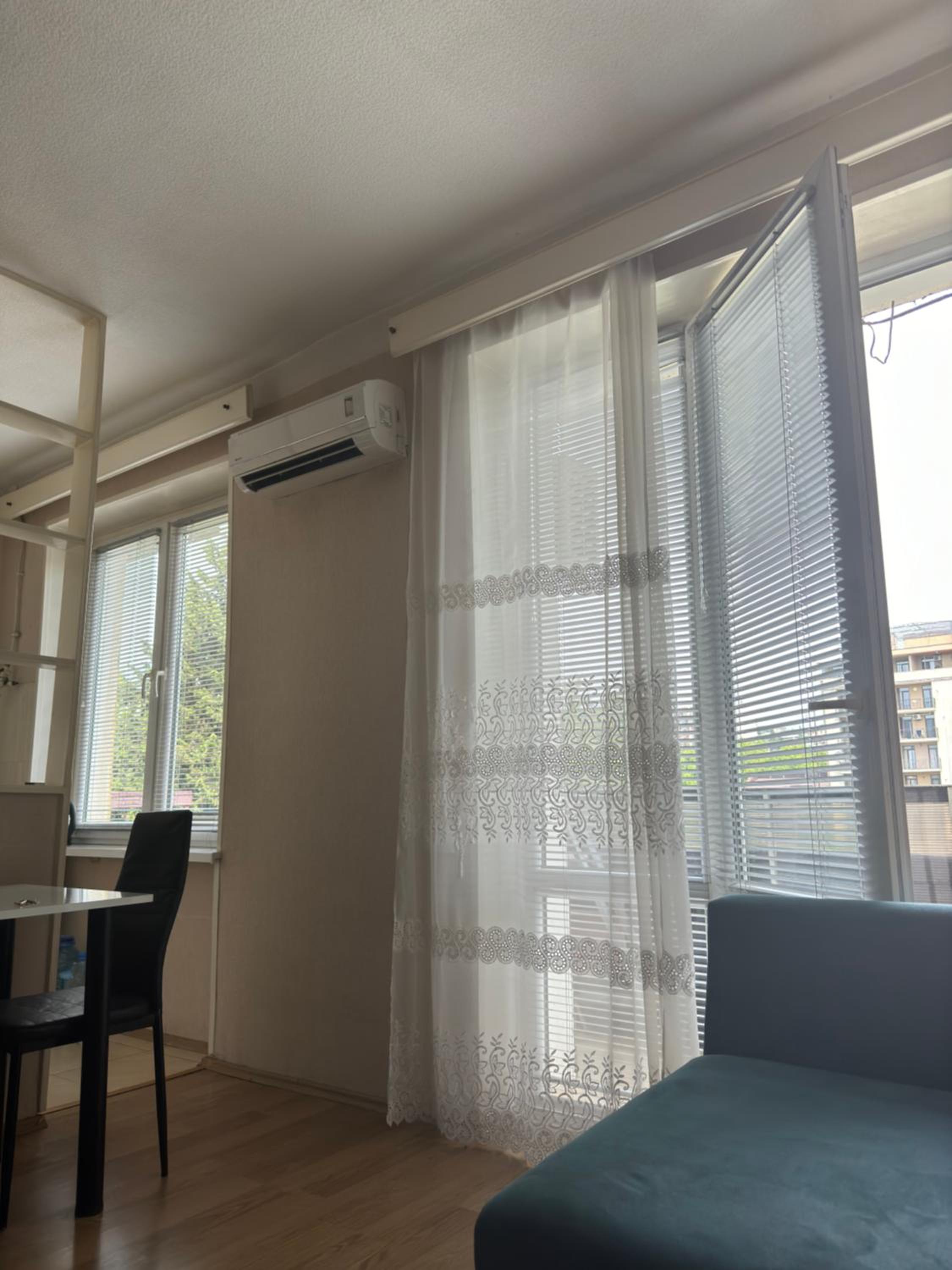 Cozy apartment with balcony view 3