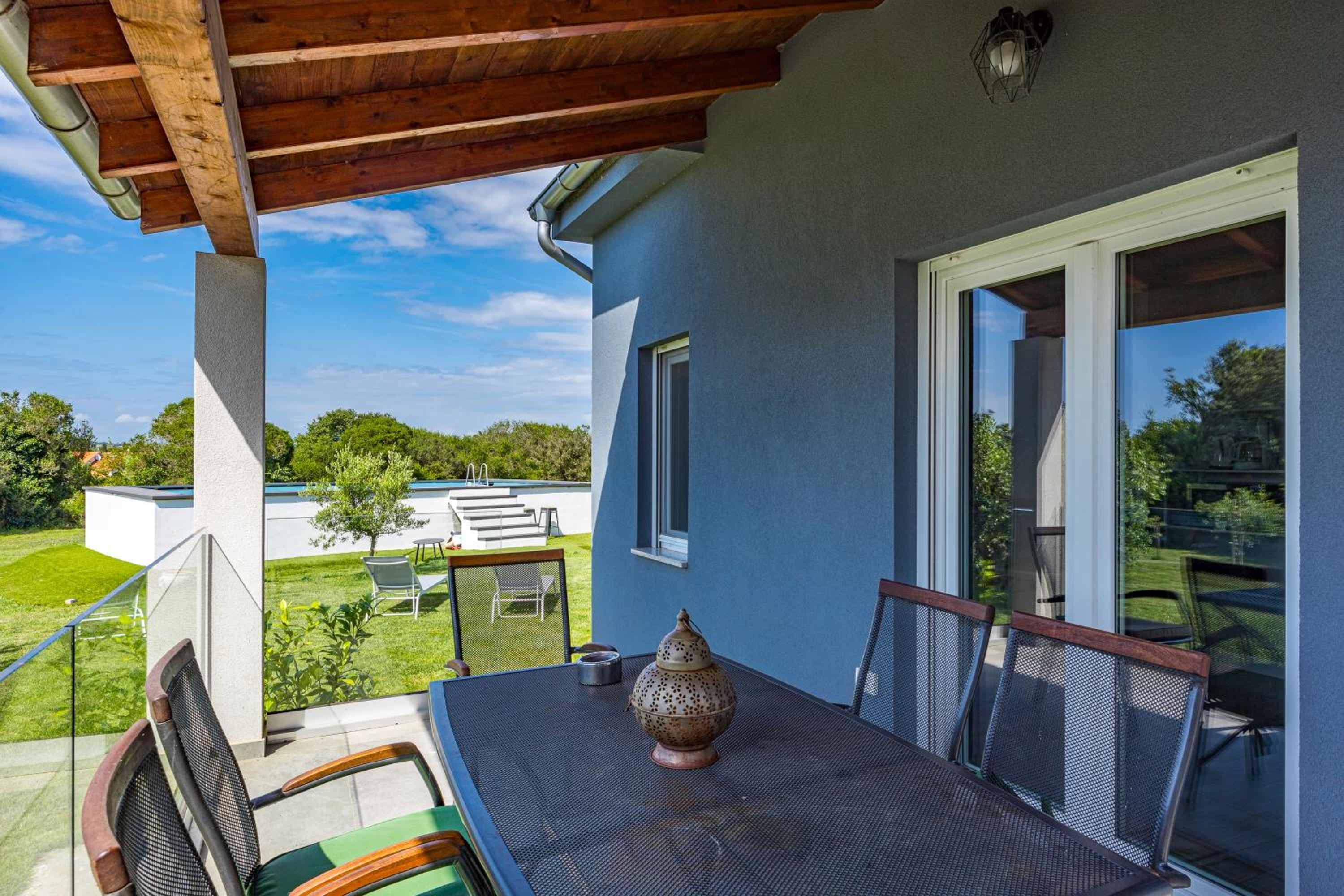 Holiday house Mirna with heated swimming pool and jacuzzi view 5