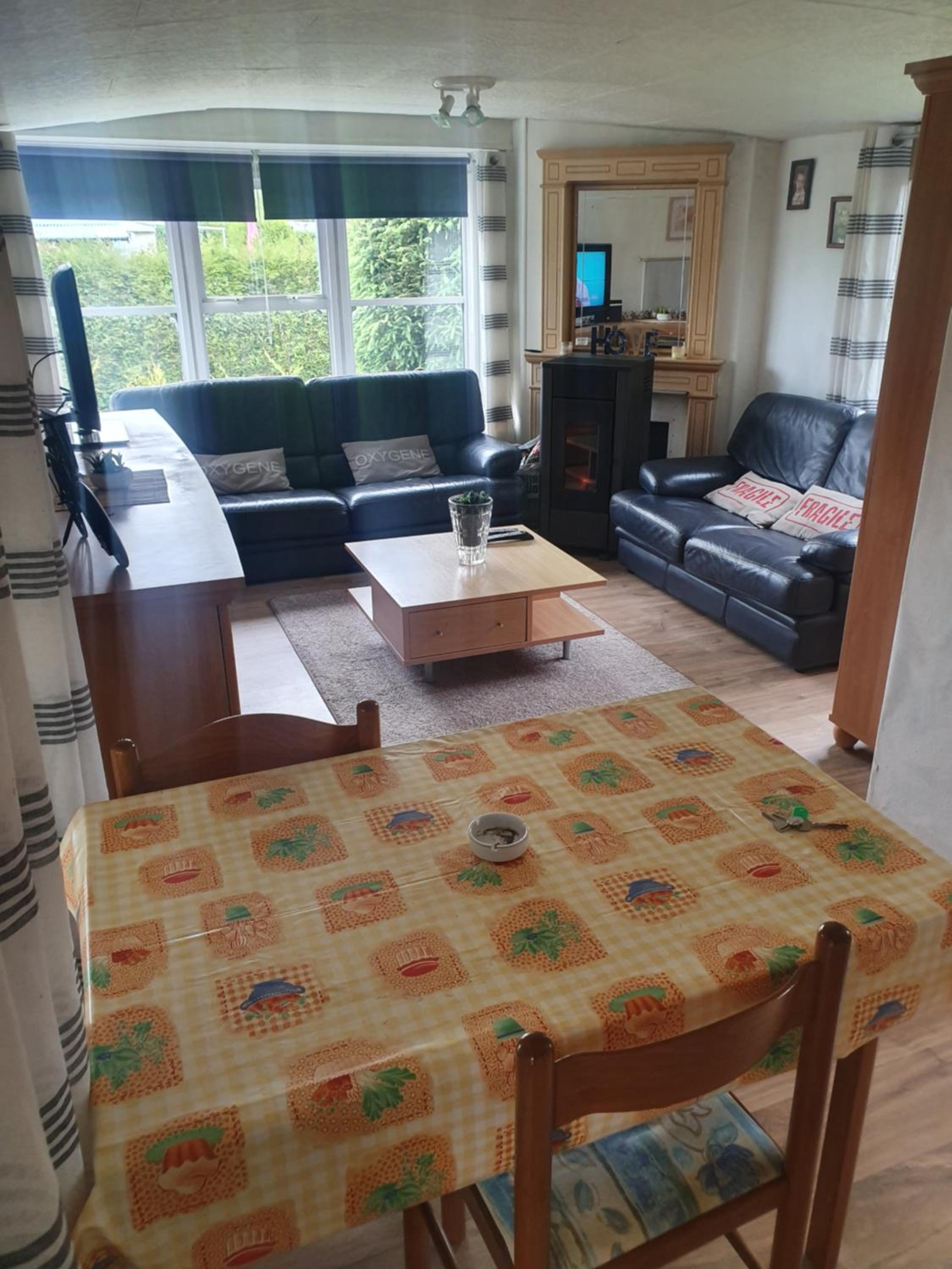 Bungalow 12mx3,60m avec grand jardin