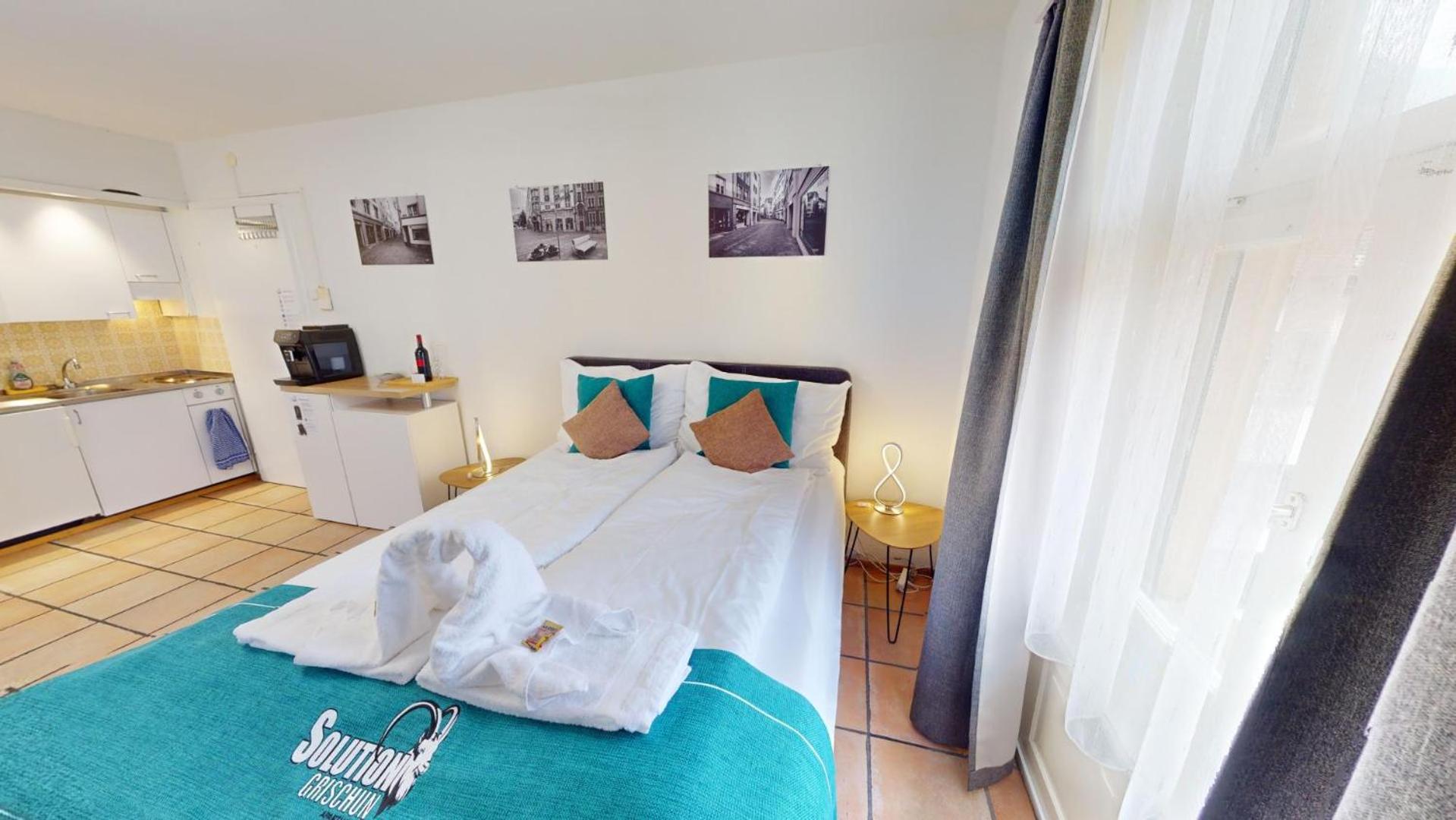 Solution-Grischun - Altstadtwohnung - Zentral - Boxspringbett - Dachterrasse - Kaffe&Tee