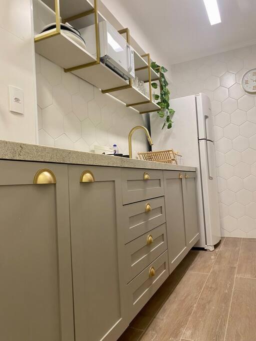 Studio dourado no coração da Av Paulista