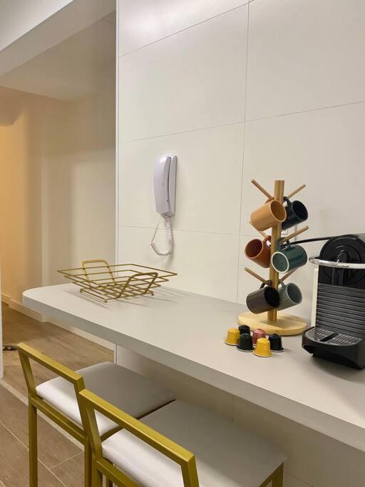 Studio dourado no coração da Av Paulista