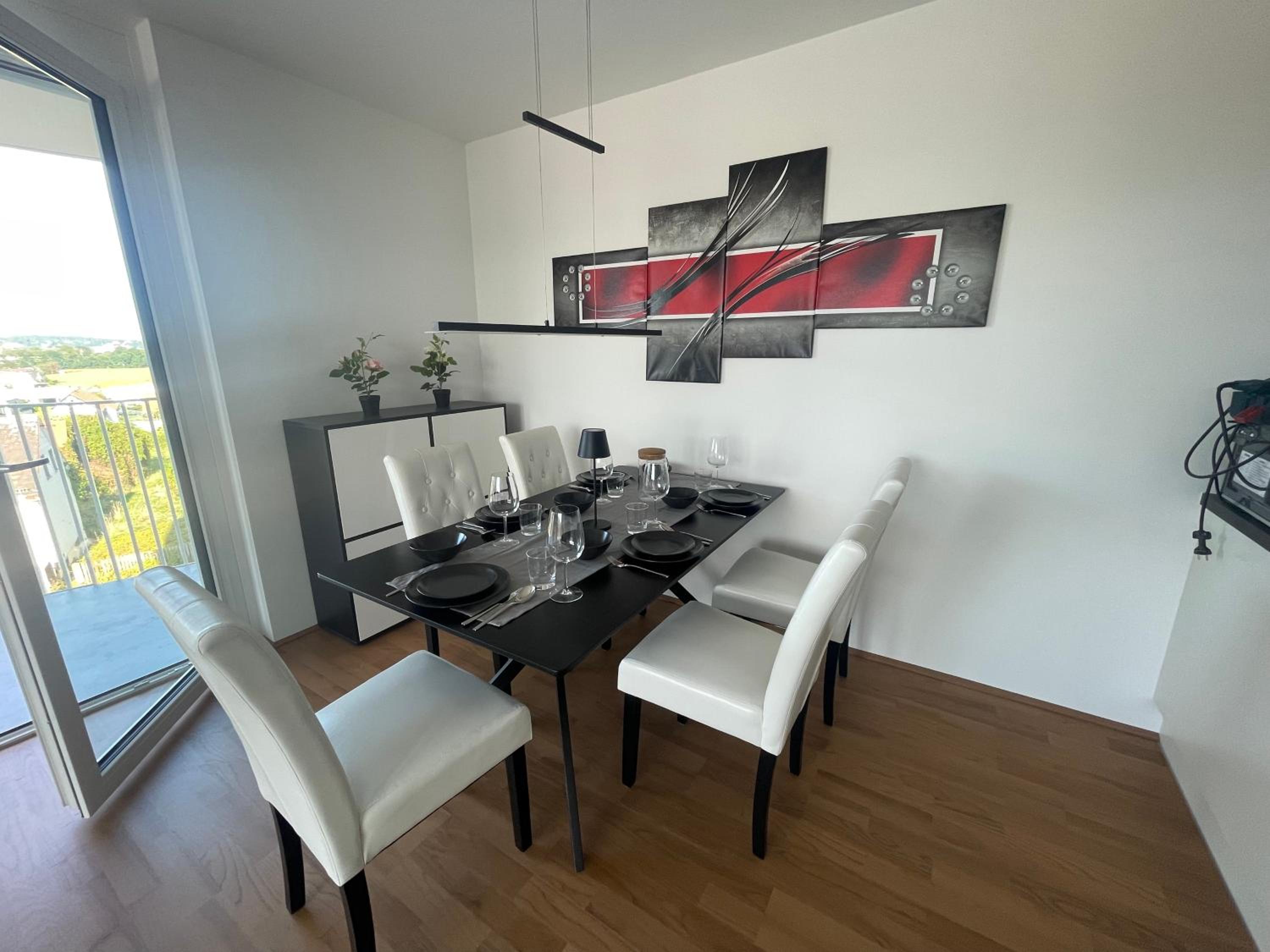 Luxusapartment mit 40 qm Terrasse, E-Parkplatz und Parkplatz