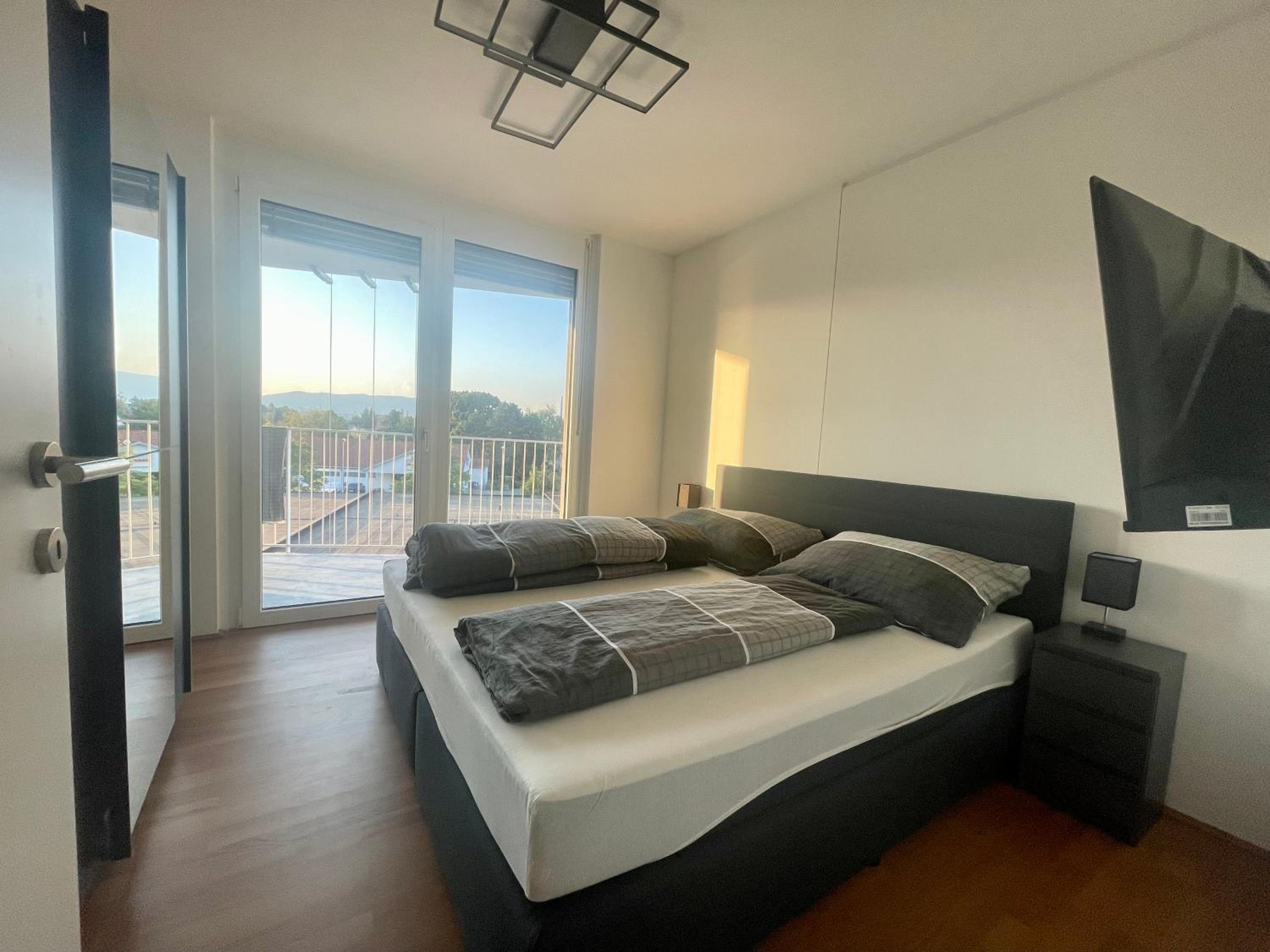 Luxusapartment mit 40 qm Terrasse, E-Parkplatz und Parkplatz