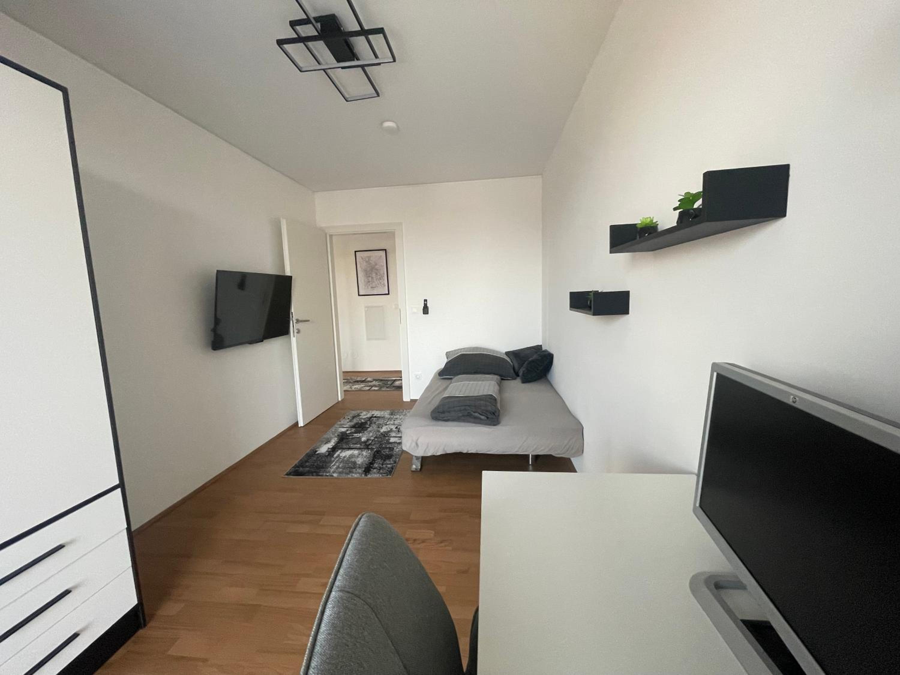 Luxusapartment mit 40 qm Terrasse, E-Parkplatz und Parkplatz