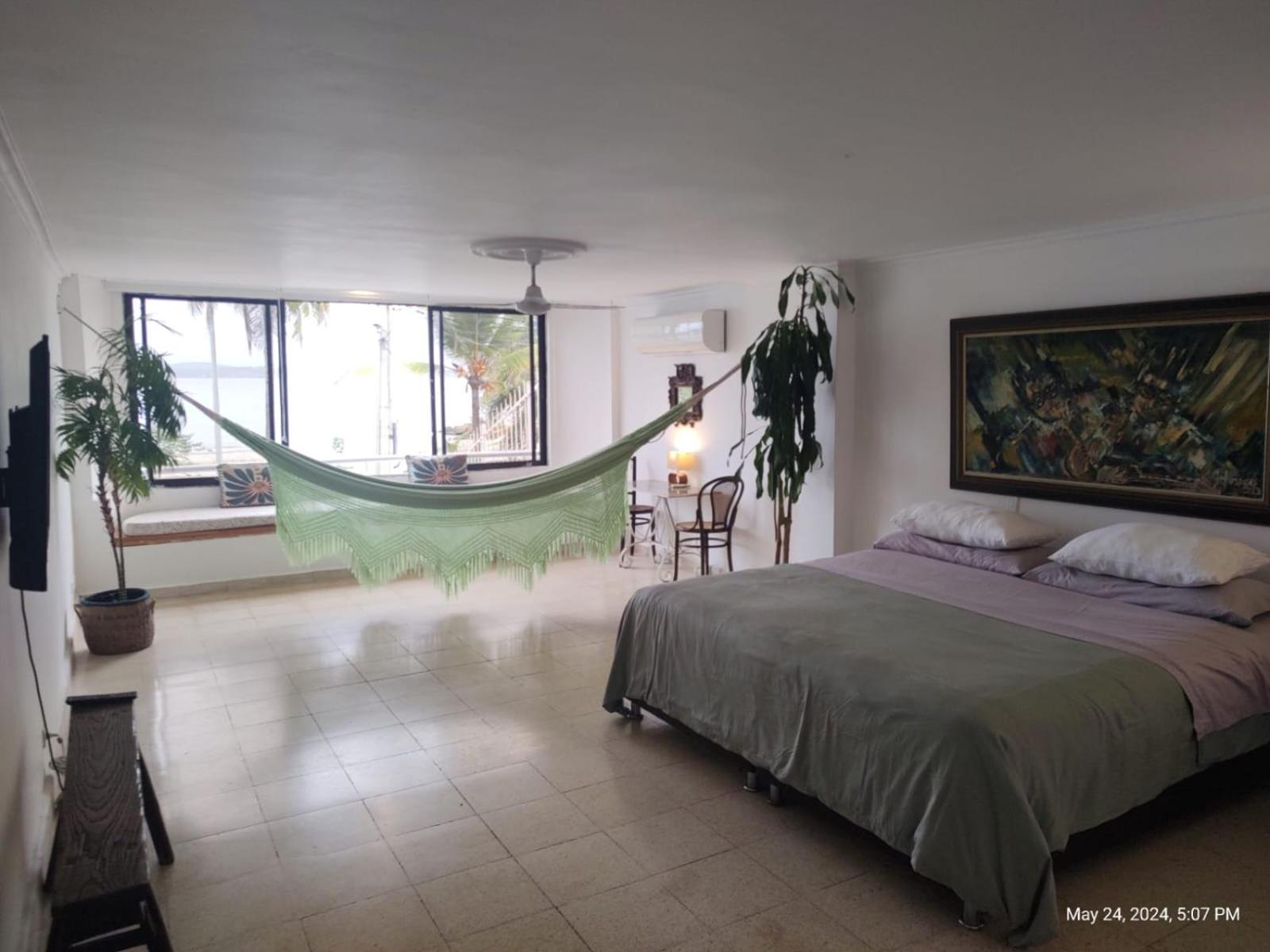 Habitación de lujo en hermosa casa frente al mar