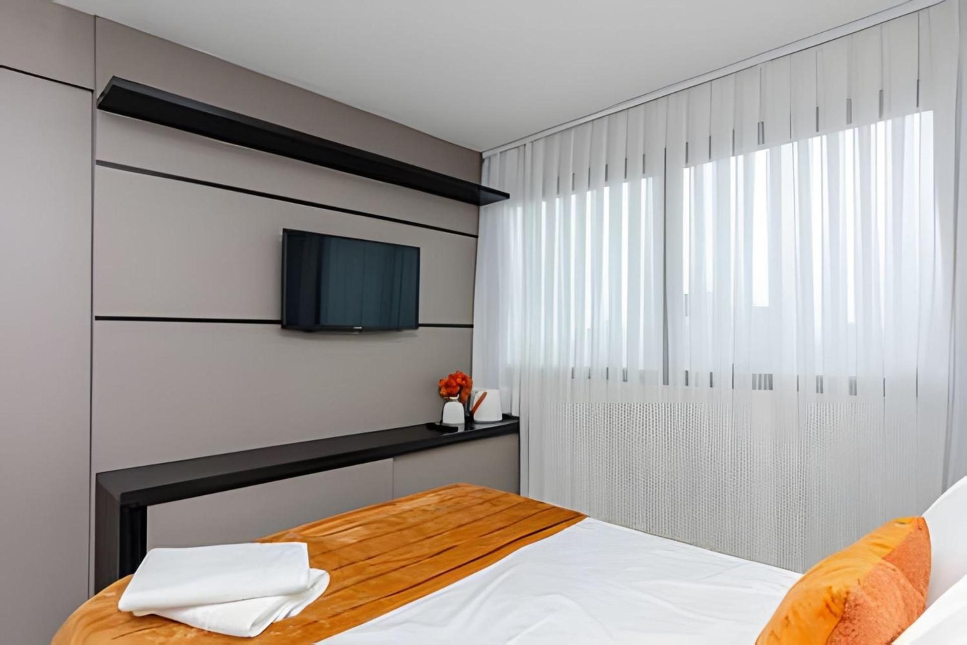 7th Avenue - Apartamentos UROOMS